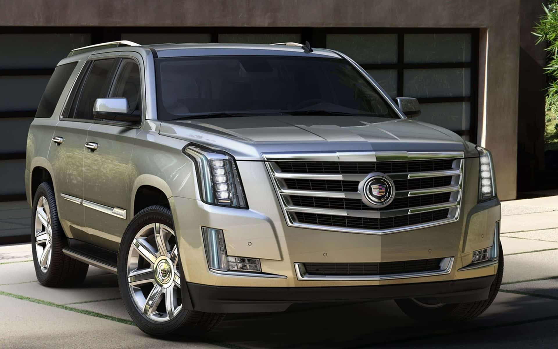 Stunning Cadillac Escalade SUV in luxurious setting Wallpaper