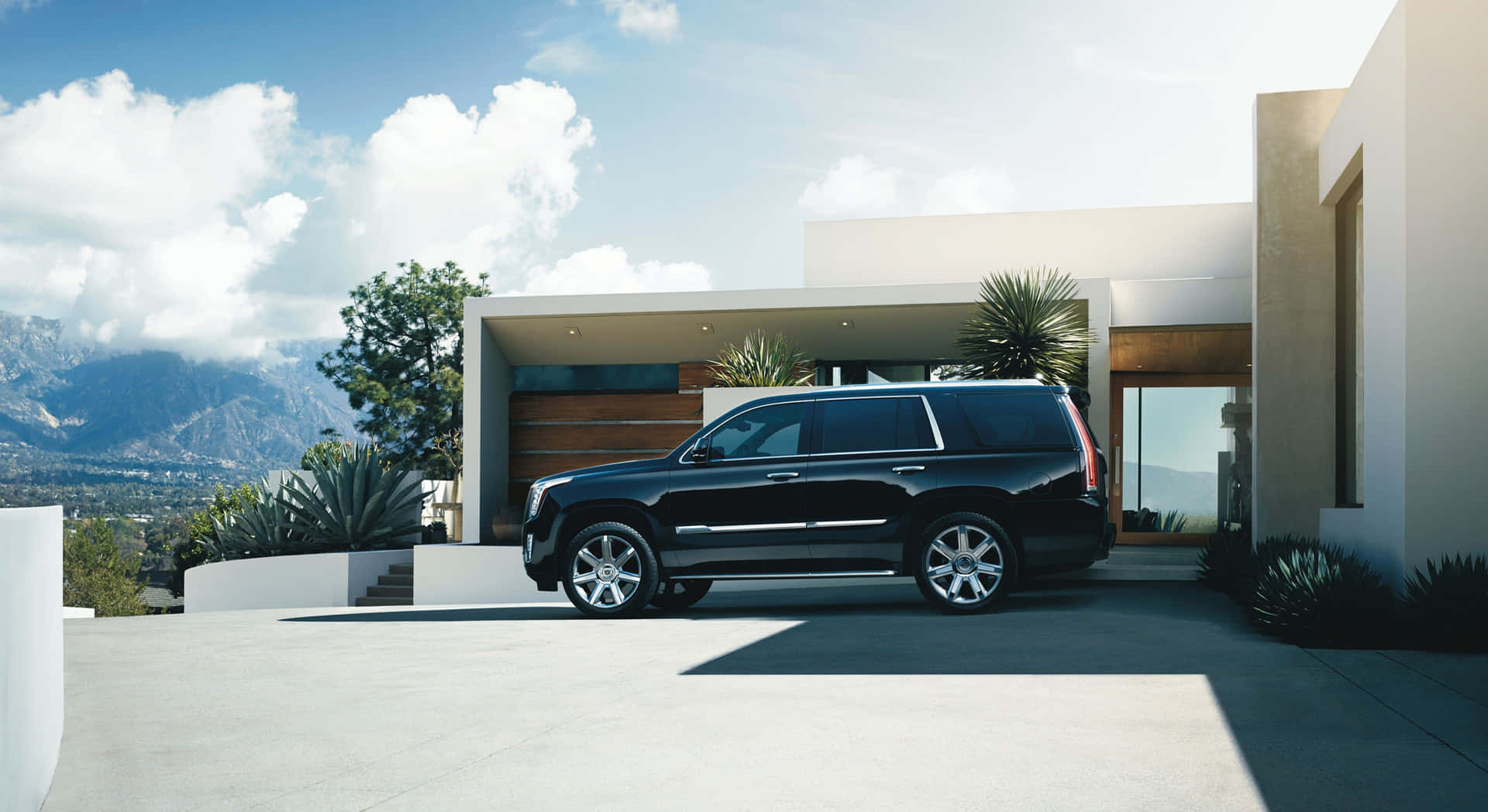 Stunning Cadillac Escalade in a luxurious environment Wallpaper