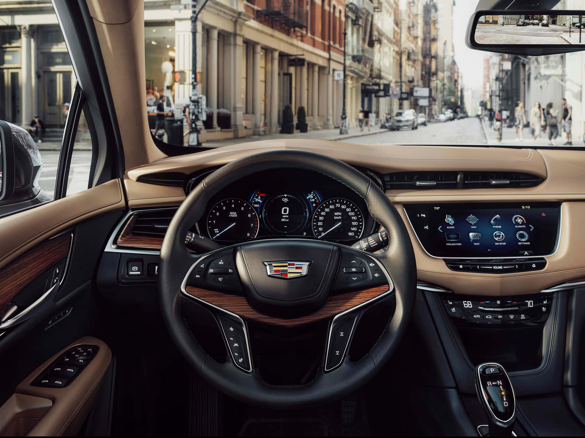 Sleek Cadillac XT5 in Vibrant City Setting Wallpaper