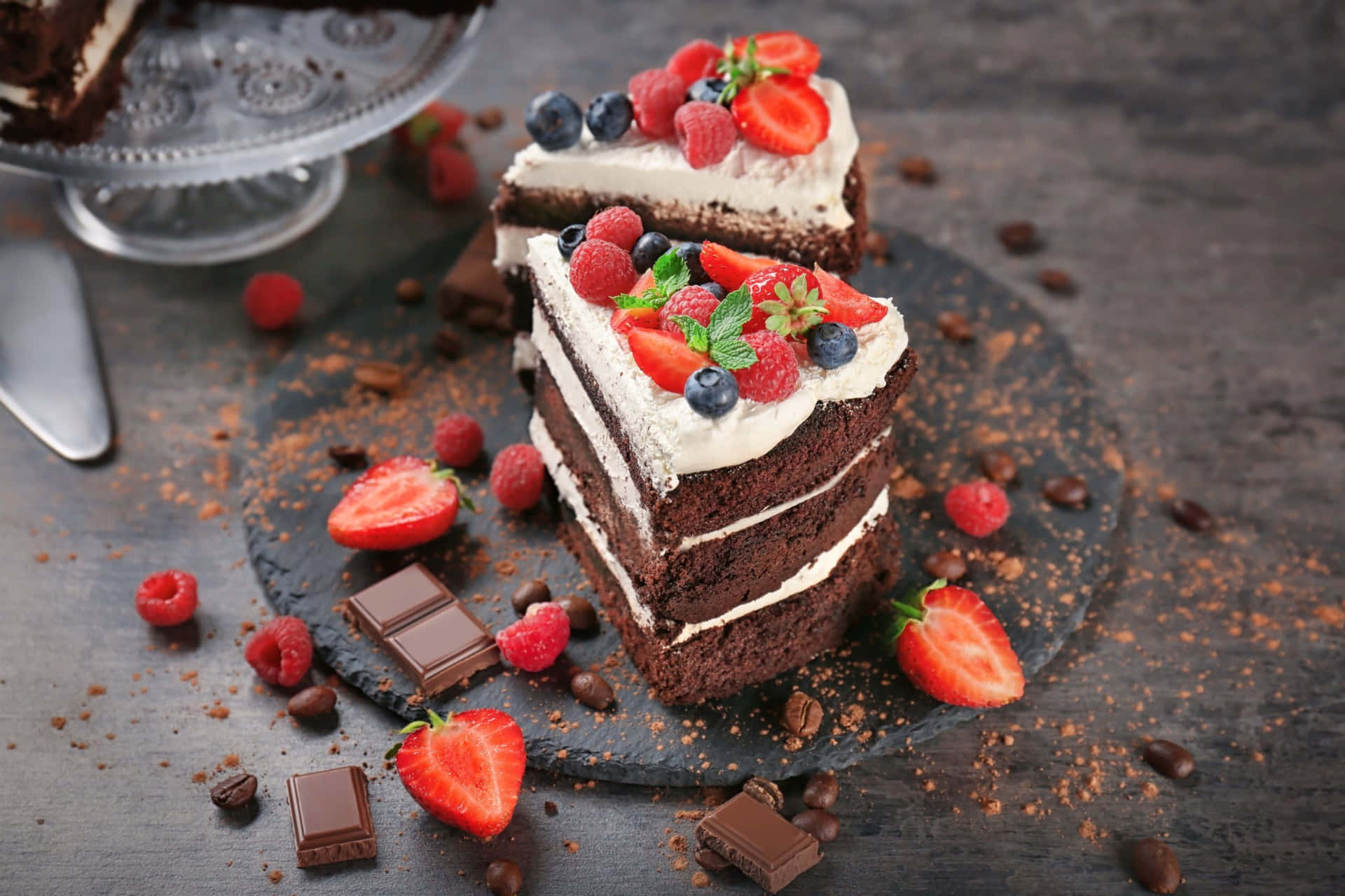 A Slice Of Chocolate Cake With Berries And Chocolate