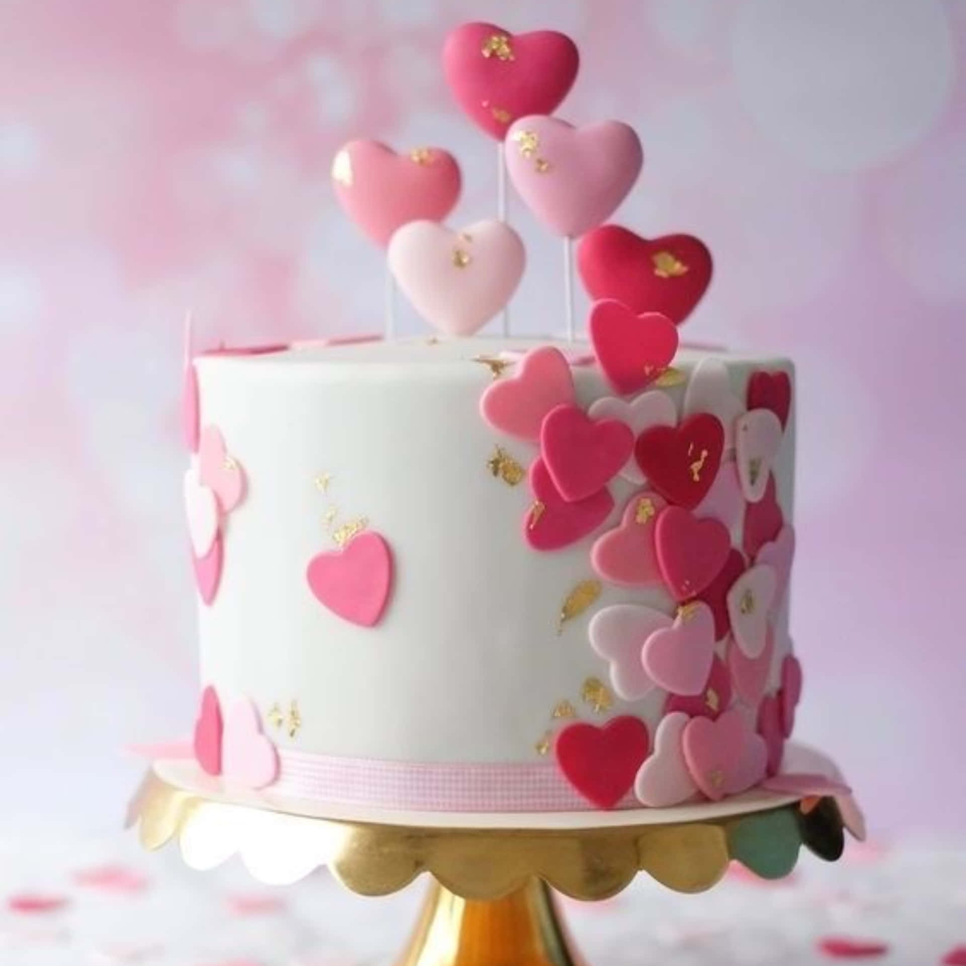 Gorgeous rose-shaped cake fondant decorated with fresh raspberries Wallpaper