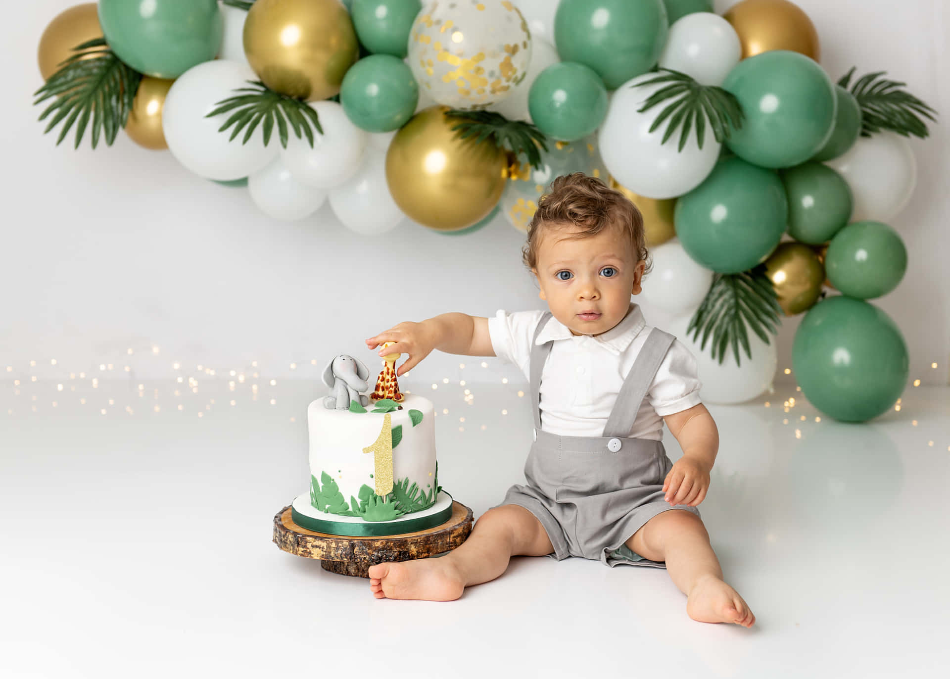 Baby With Green And Gold Cake Smash Picture