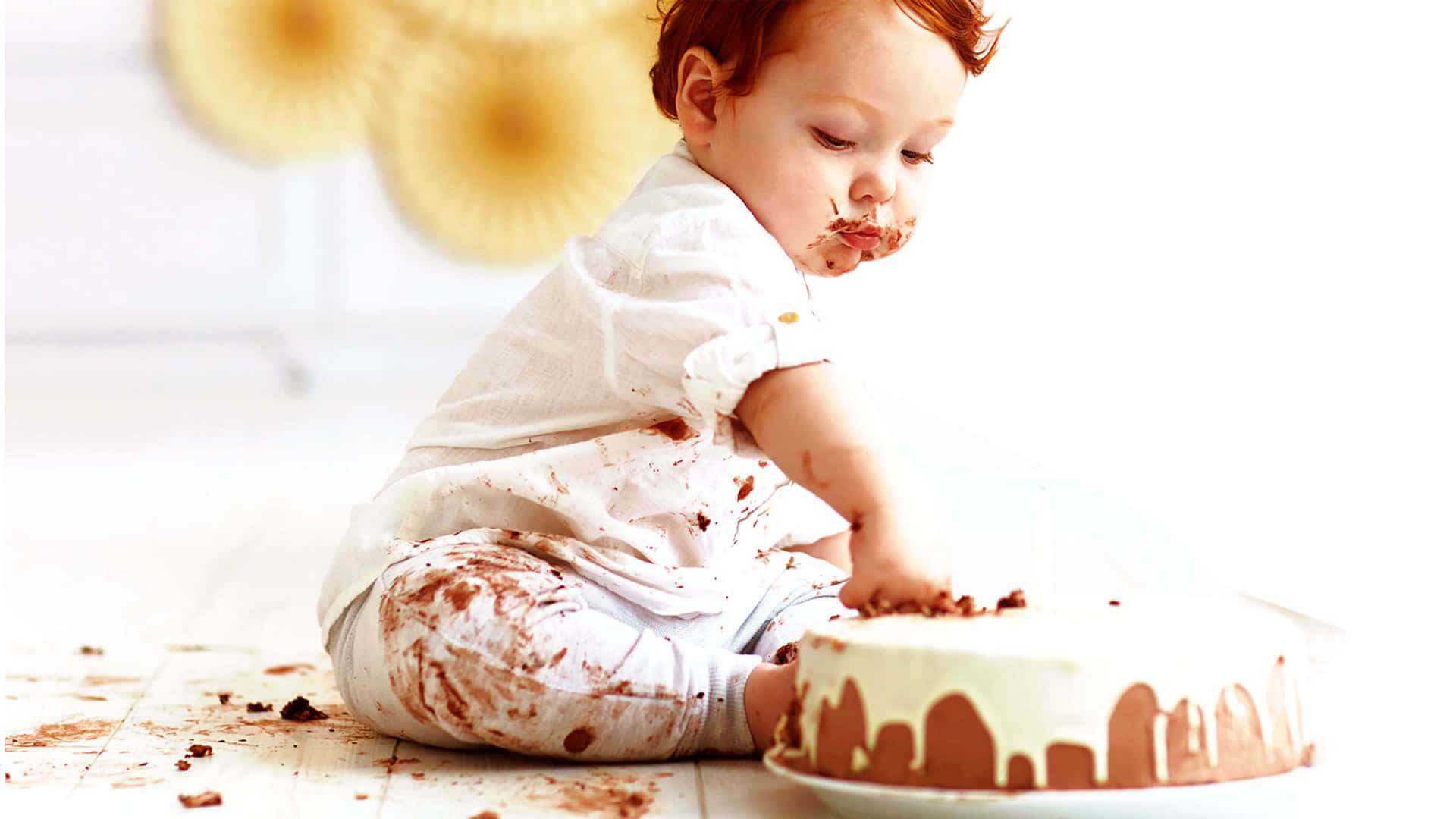 Kuchenzertrümmerung Baby Jungen Bild