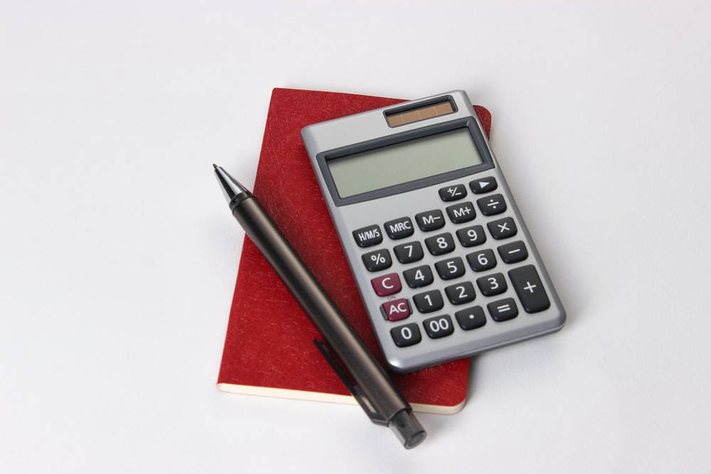 Calculator On Red Book Picture