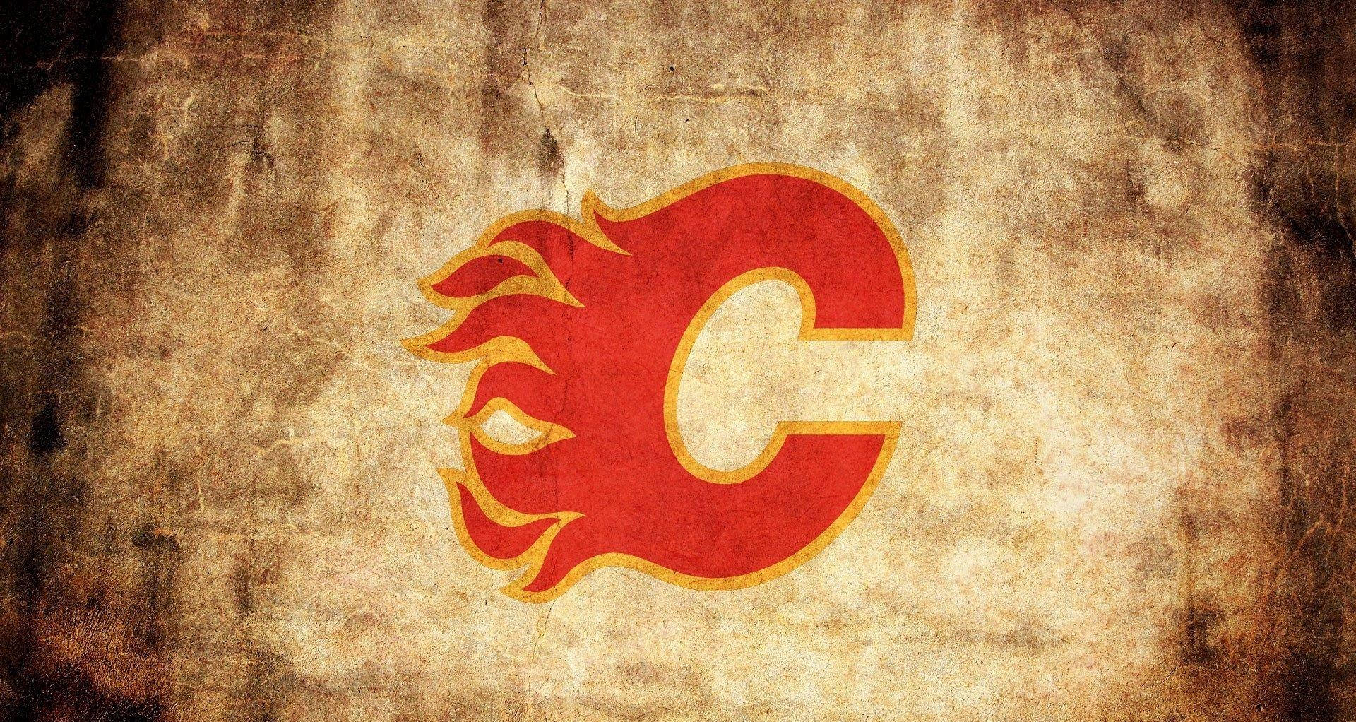 Calgary Flames Logo på brunt baggrund Wallpaper