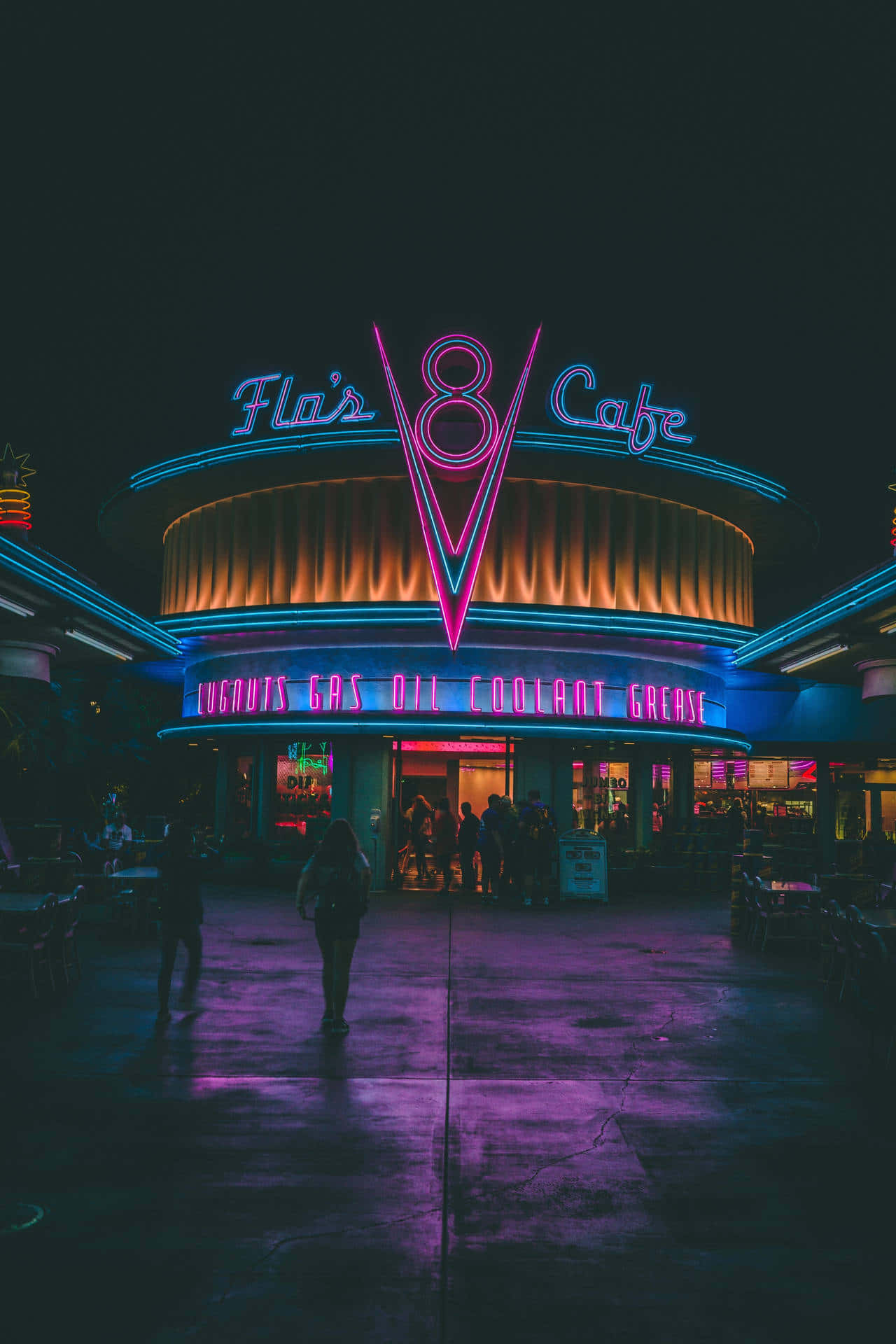 A Neon Sign For The Flint Cafe At Night Wallpaper
