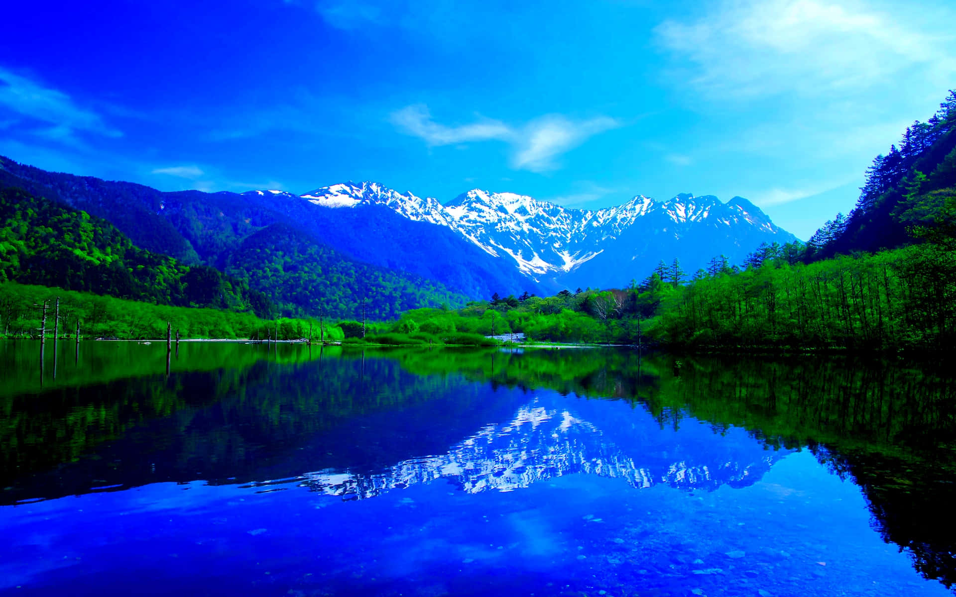 A Mountain Range Reflected In A Lake