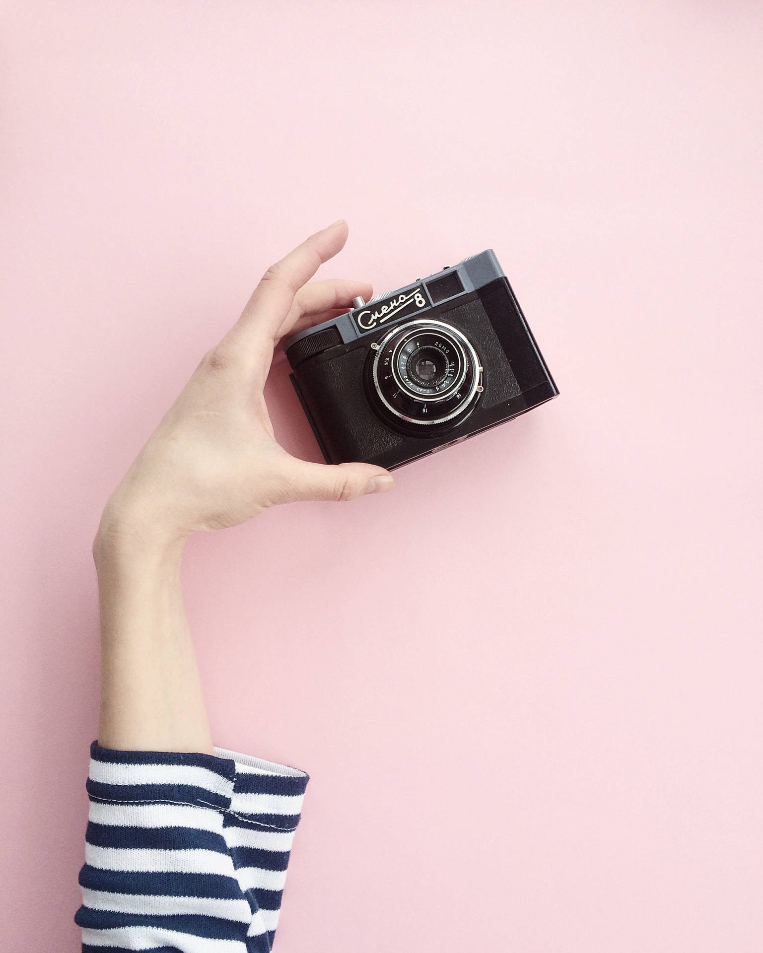 Camera On A Pink Background Wallpaper