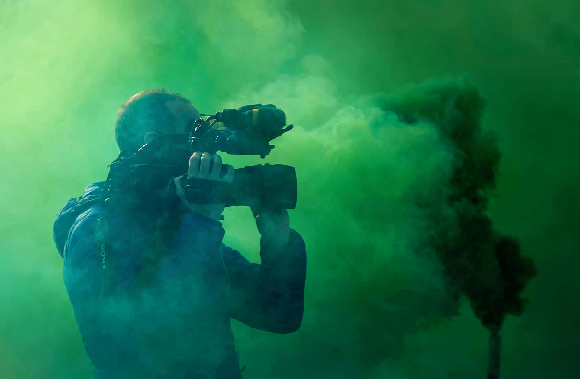 Cameramanin Green Haze Wallpaper
