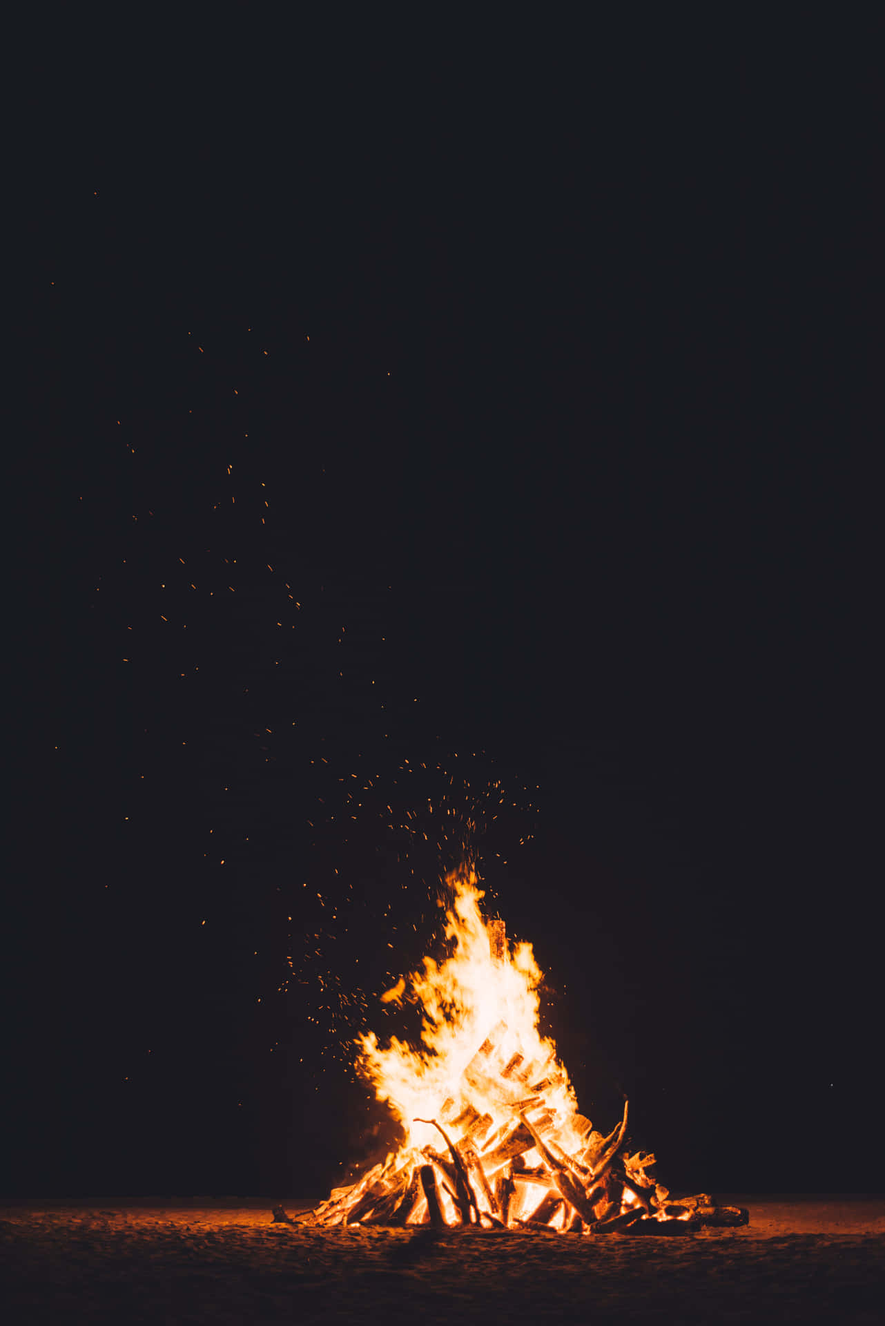 Campfire Glowing Fire Pitch Black Night Wallpaper