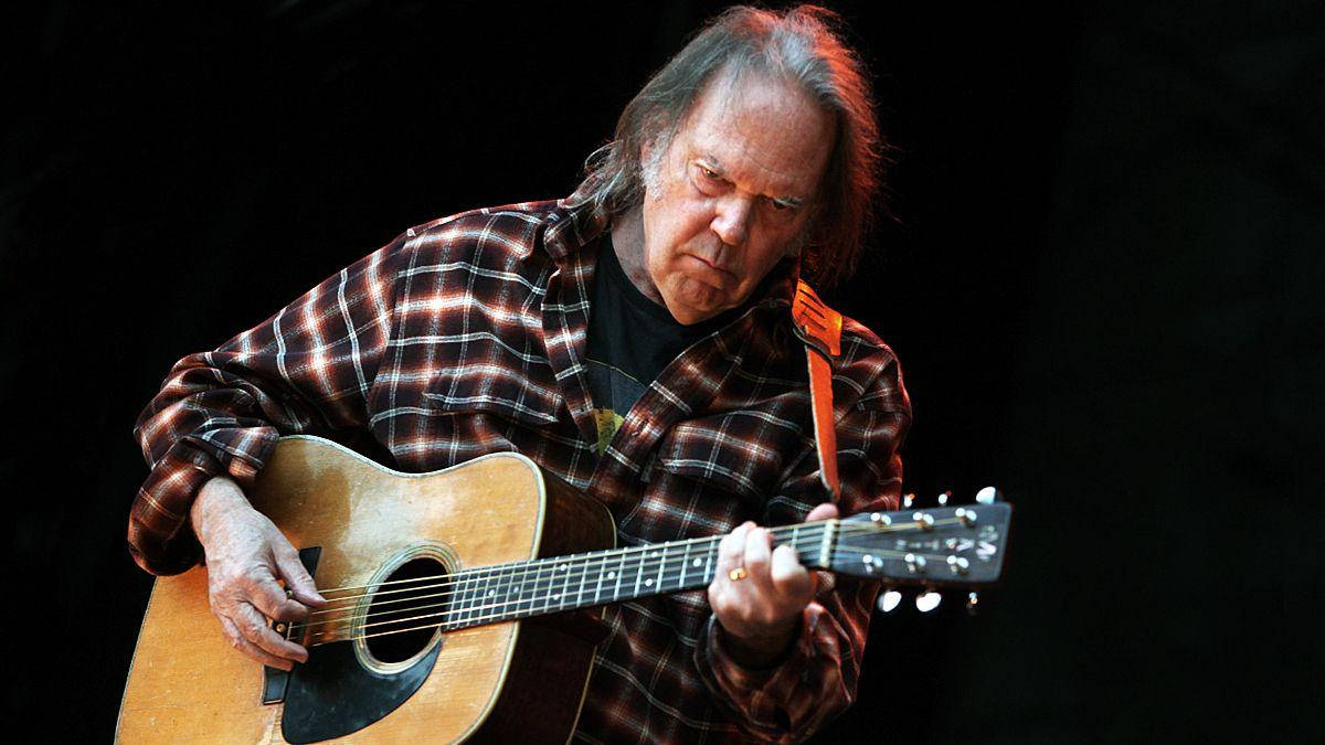 Canadian Music Legend Neil Young Performance Wallpaper