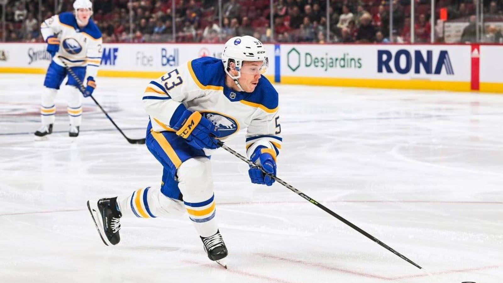 Canadisk NHL-spiller Jeff Skinner i blå og gul trøje Wallpaper