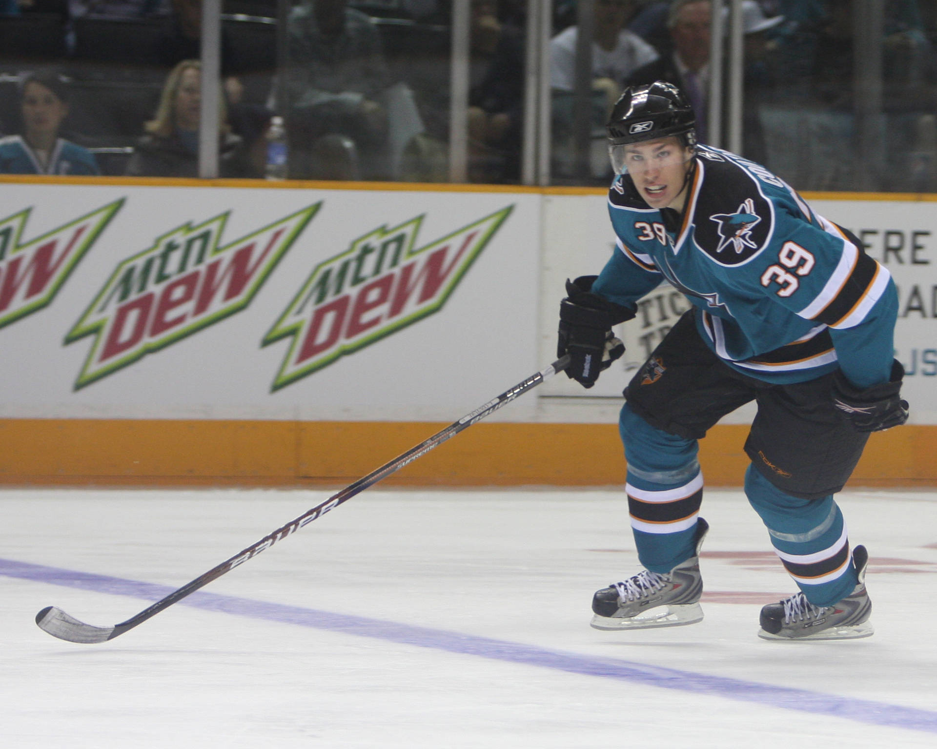 Canadian Professional Ice Hockey Center Logan Couture On Rink Wallpaper