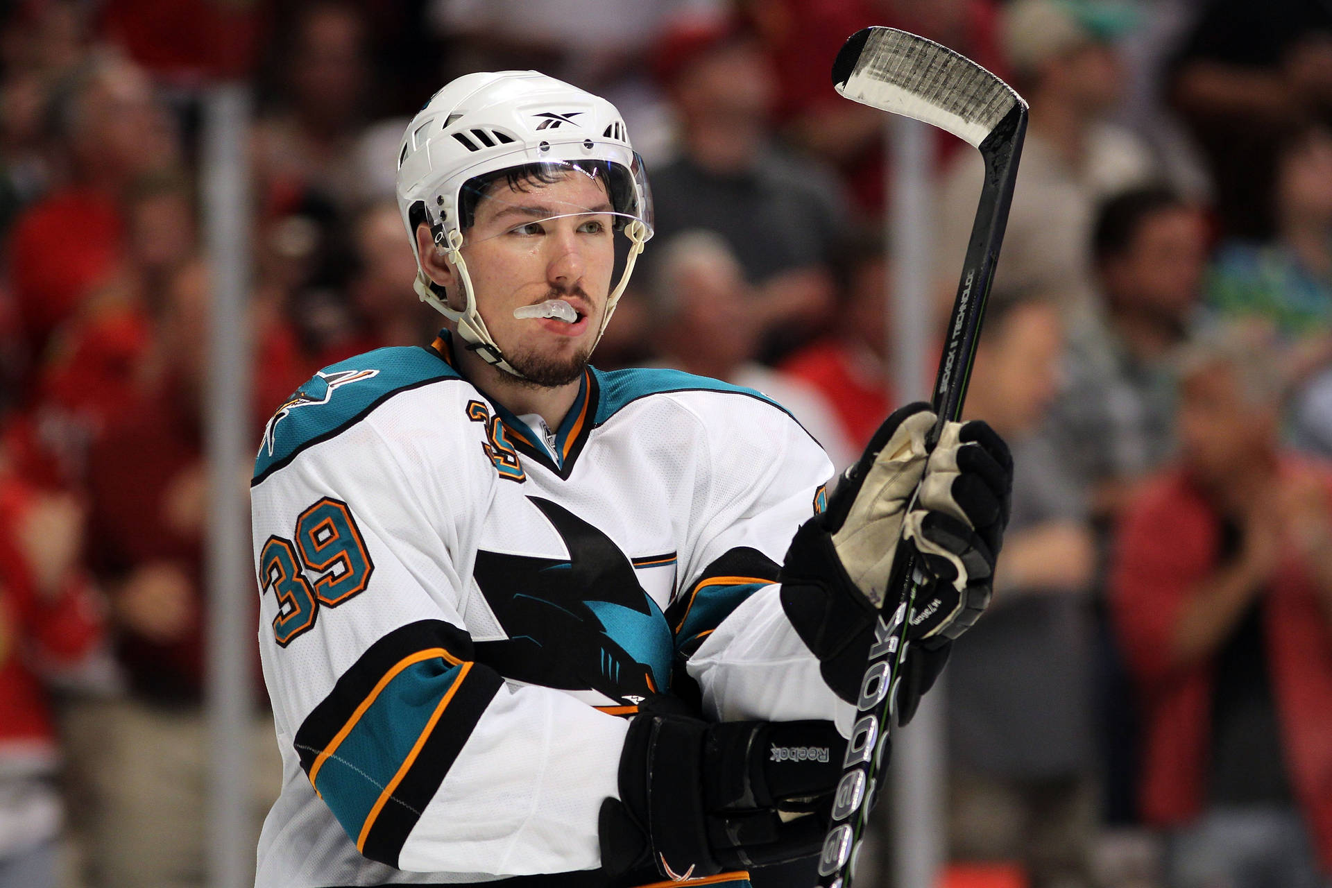 Canadian Professional Ice Hockey Center Logan Couture Stick Wallpaper