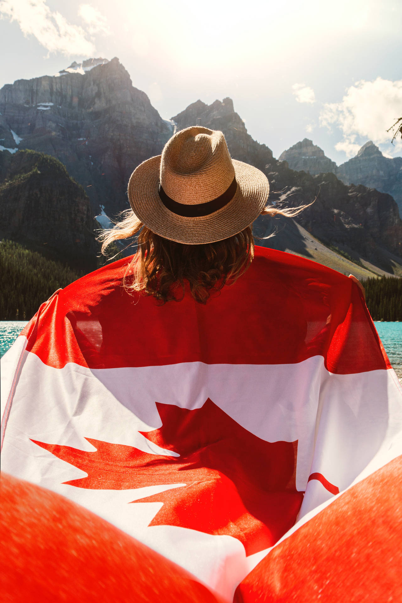 Canadisk kvinde foldet flag Wallpaper