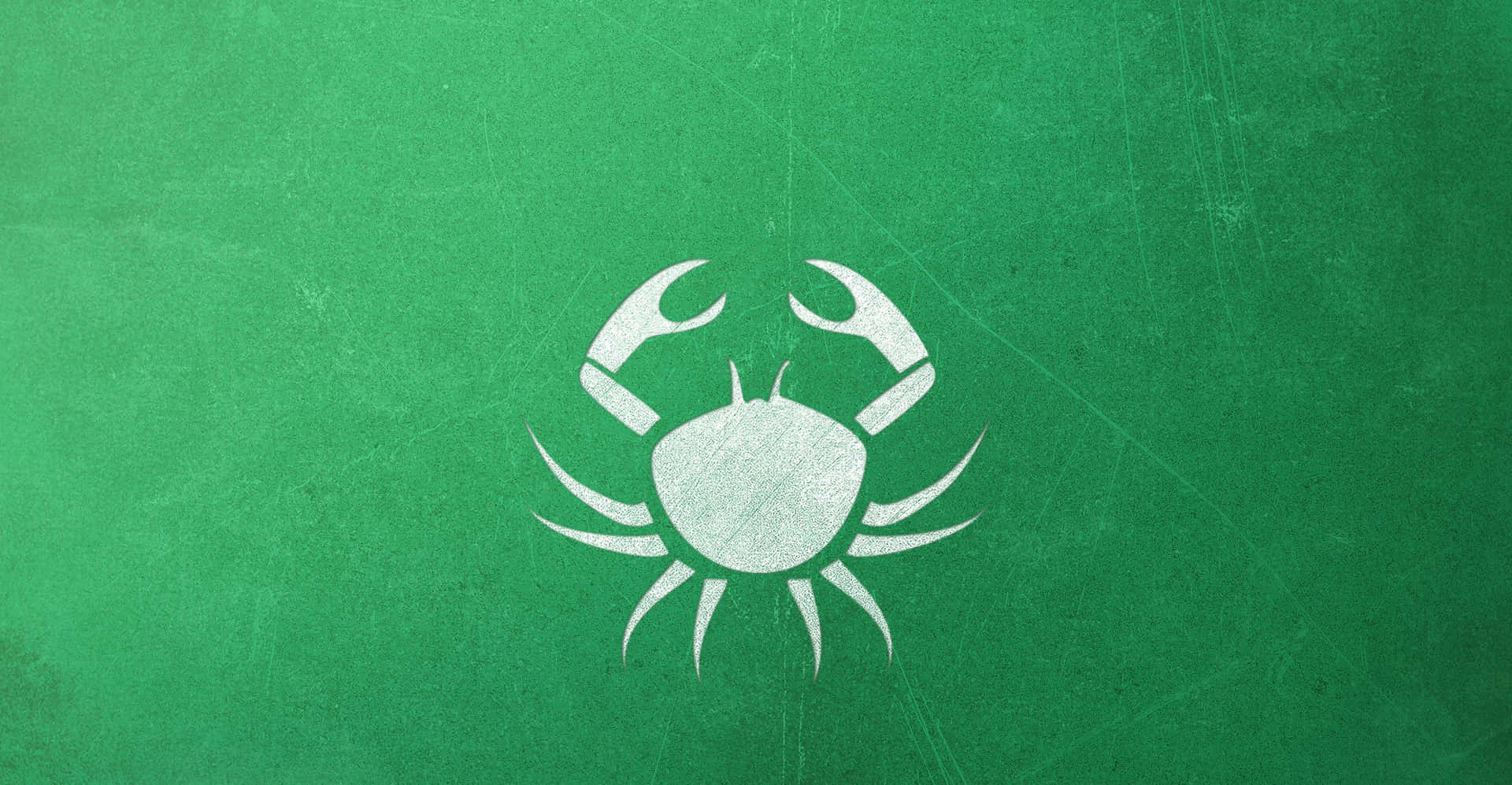 A Crab Logo On A Green Background