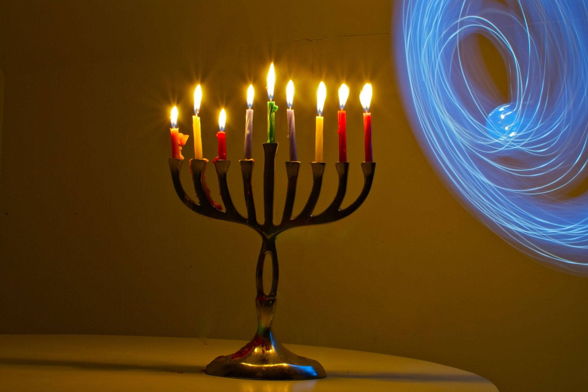 Enlightening Hanukkah - Brilliant Candelabra Flames Wallpaper