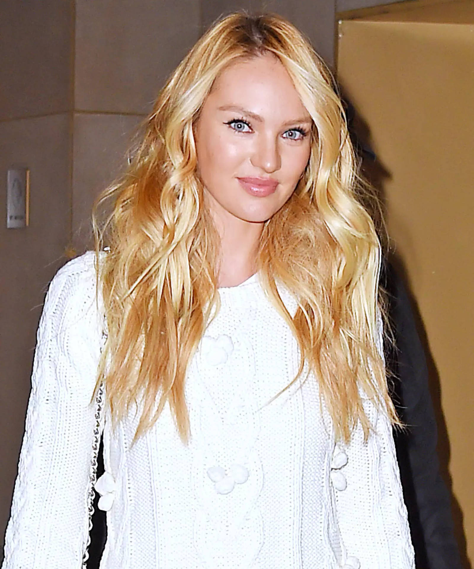 Candice Swanepoel Showcasing Her Natural Beauty In A Designer Outfit. Wallpaper