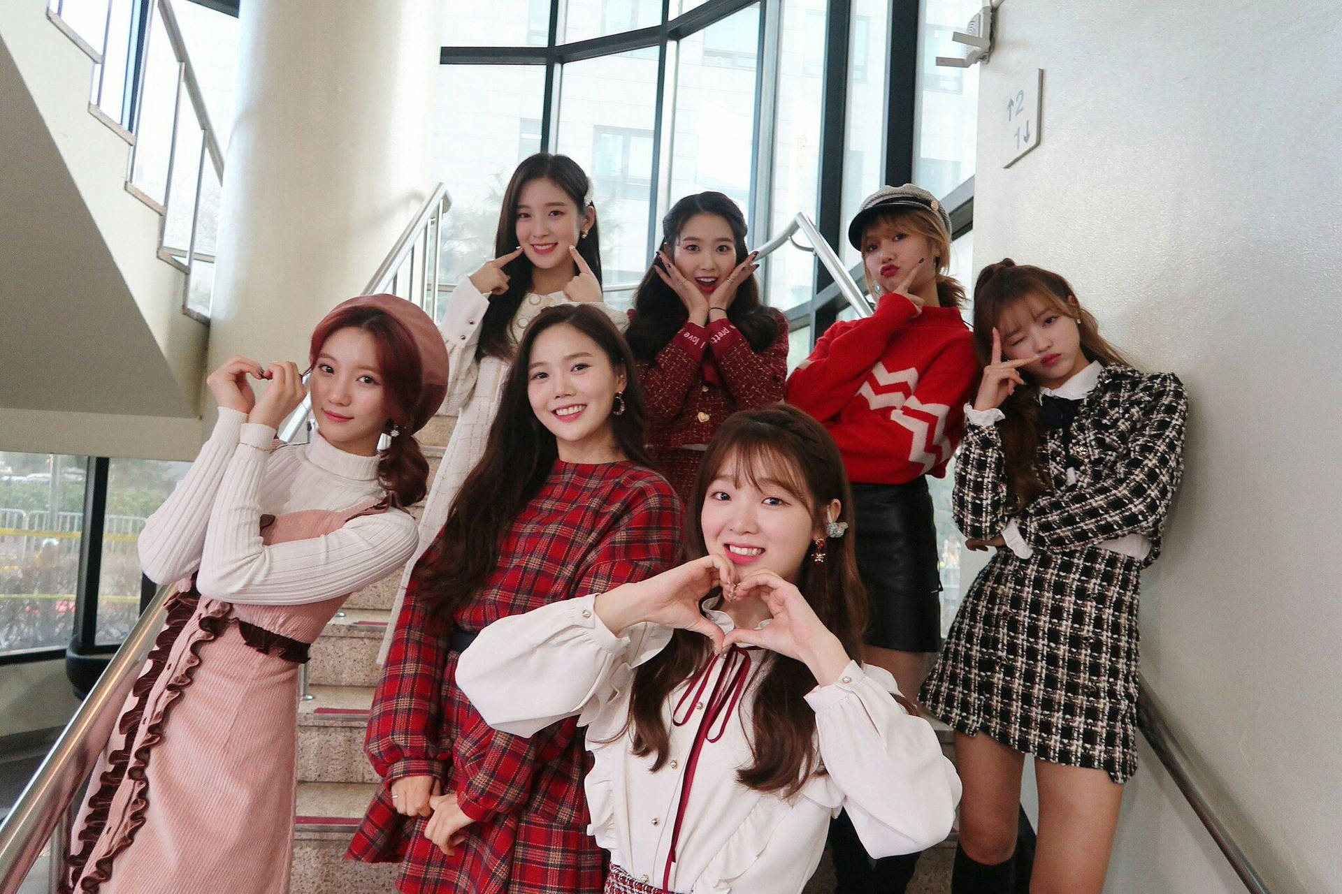 South Korean pop sensation OH MY GIRL in a candid group photo Wallpaper
