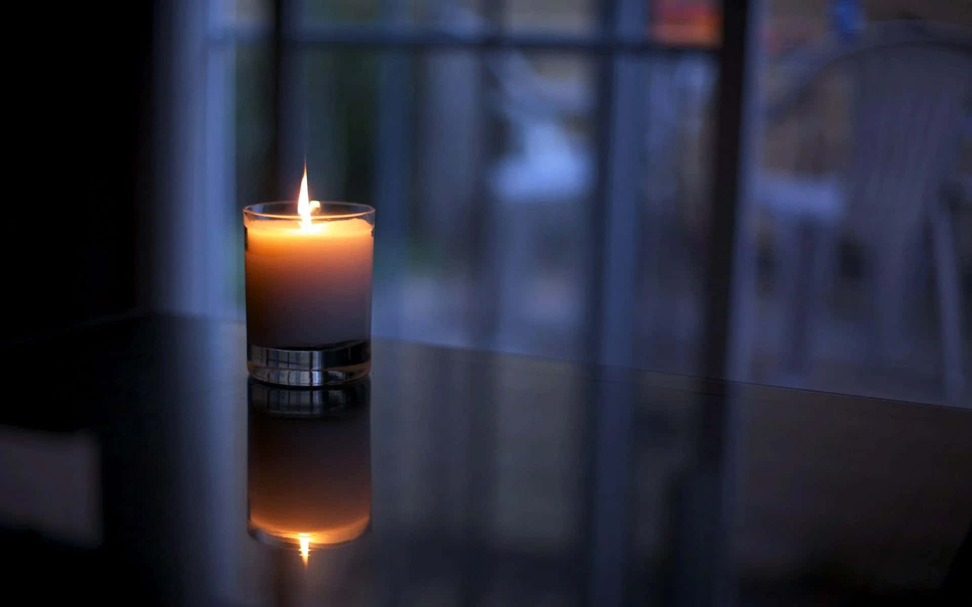 Feel the calming ambiance of a lit candle