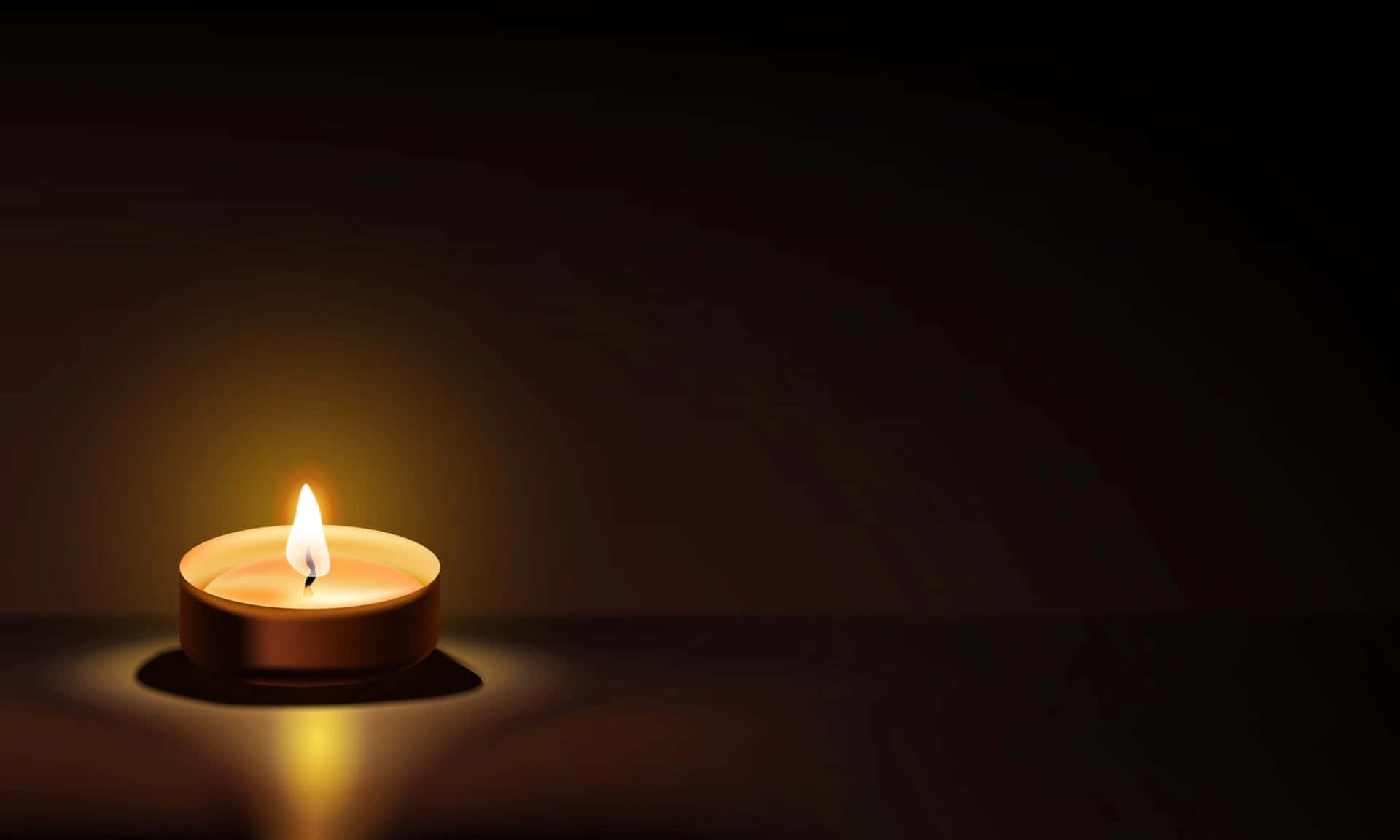 A Candle Is Lit On A Dark Background
