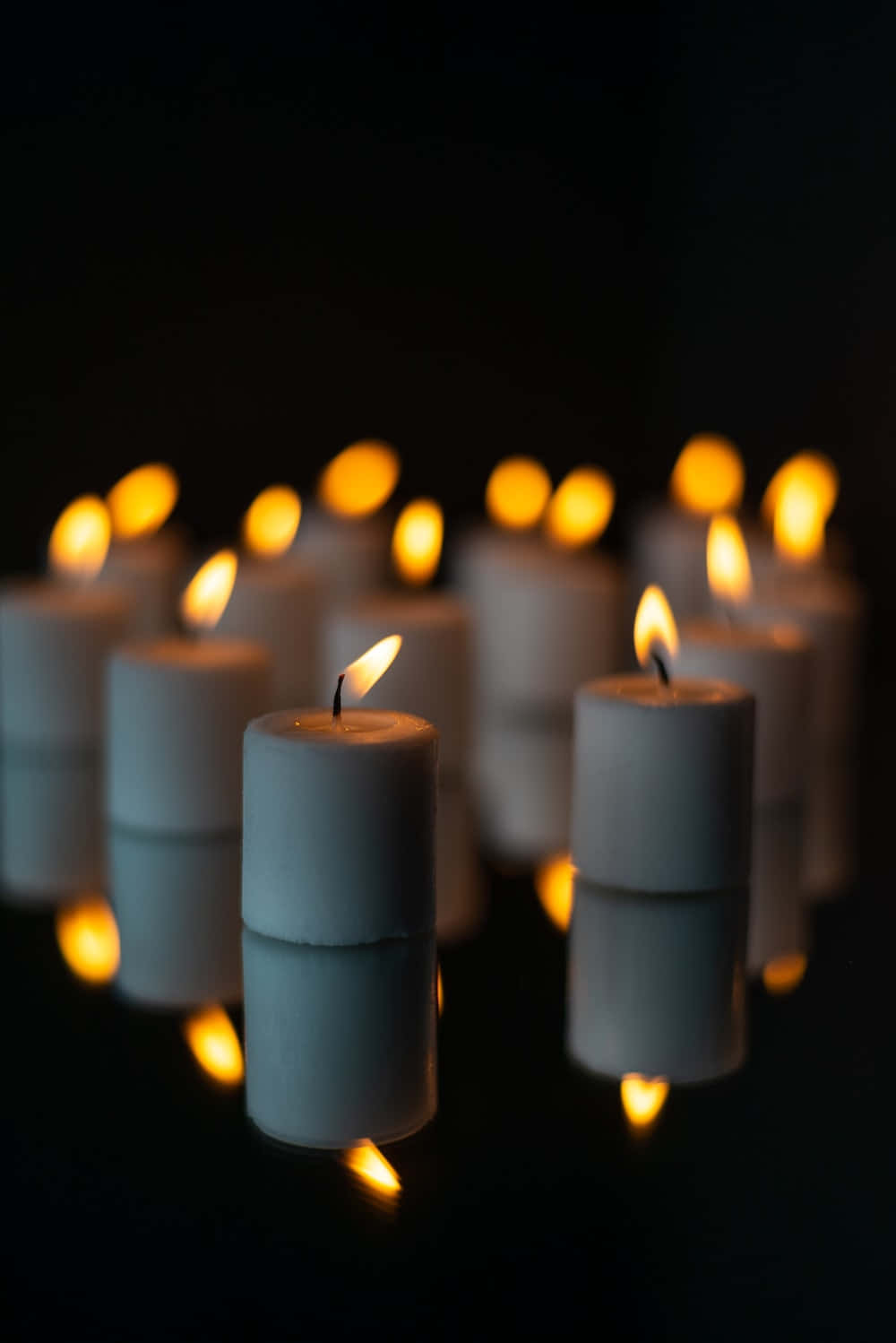 Image  Soft Candlelight Illuminates a Dark Room