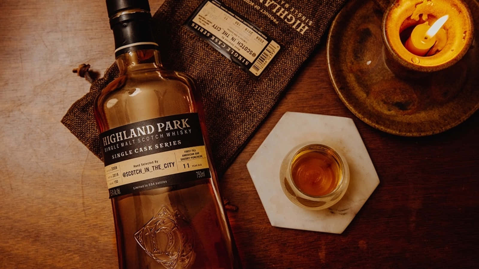 Candle Light Table With Highland Park Whiskey Wallpaper
