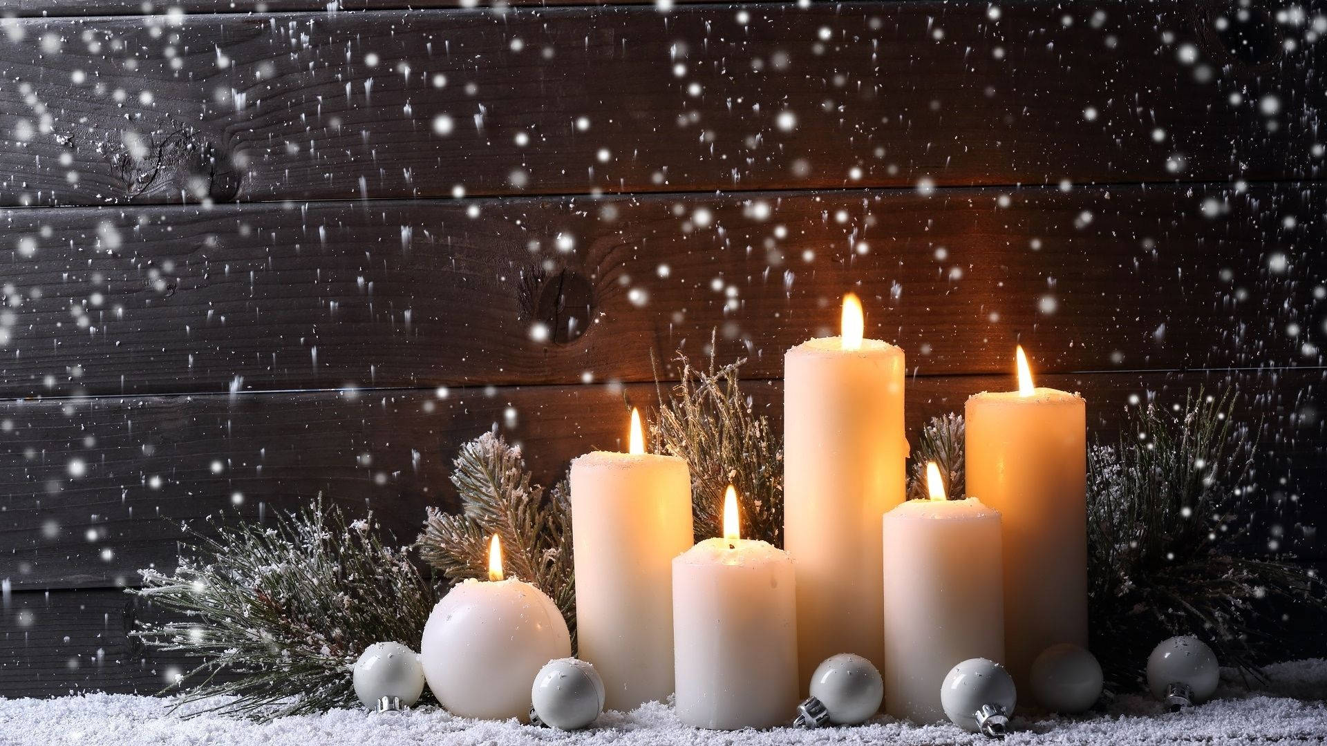 Candles In A Snowy Place Wallpaper