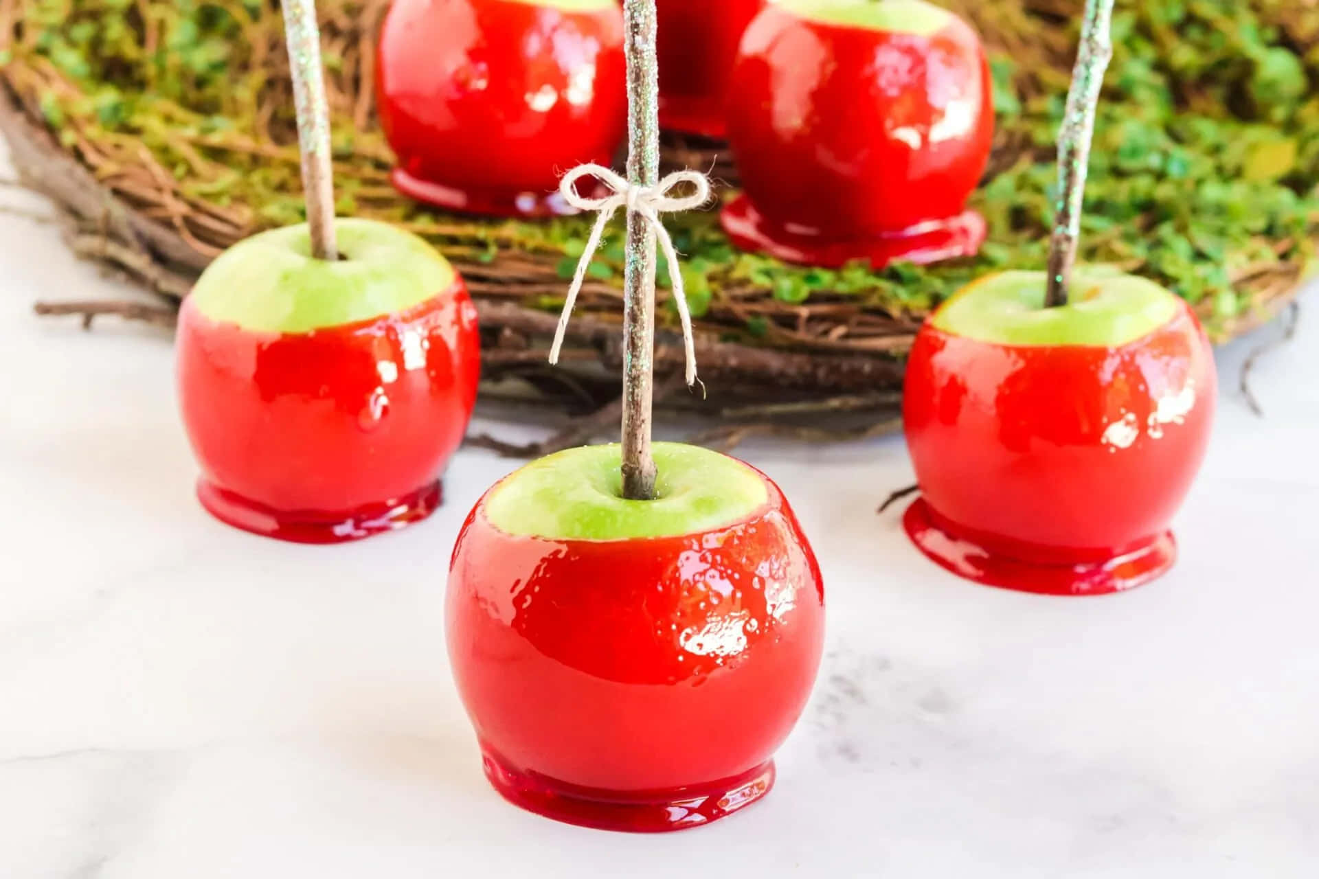 Colorful Candy Apples Display Wallpaper