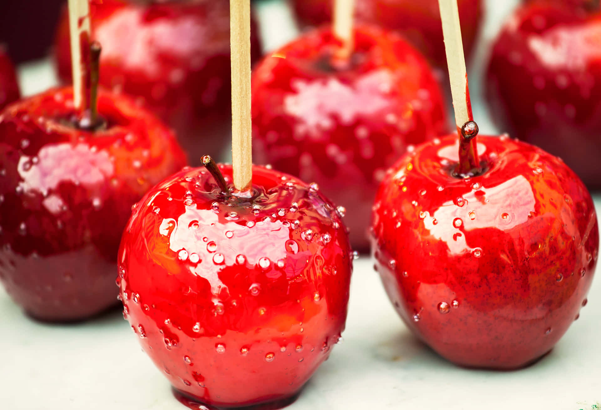 Delicious Red Candy Apples Wallpaper