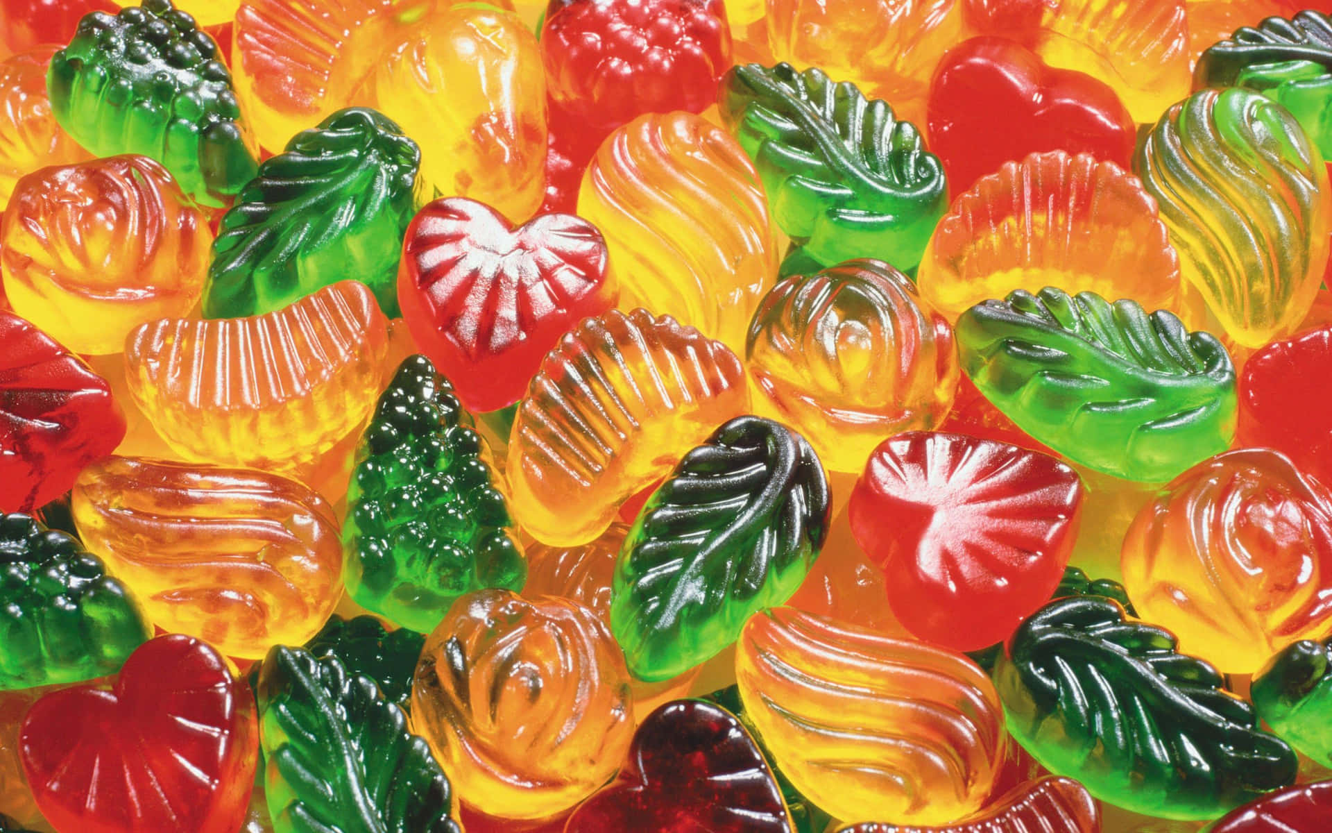 Genießedie Süßesten Leckereien Mit Einem Bezaubernden Hintergrund Aus Bonbons