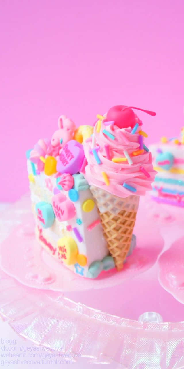 A Pink Cake With Ice Cream And Sprinkles On Top