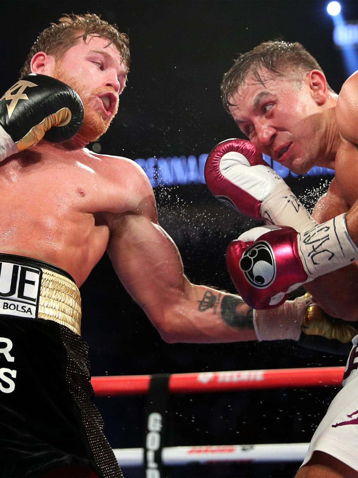 Image  Boxer Canelo Alvarez wincing after taking a punch Wallpaper