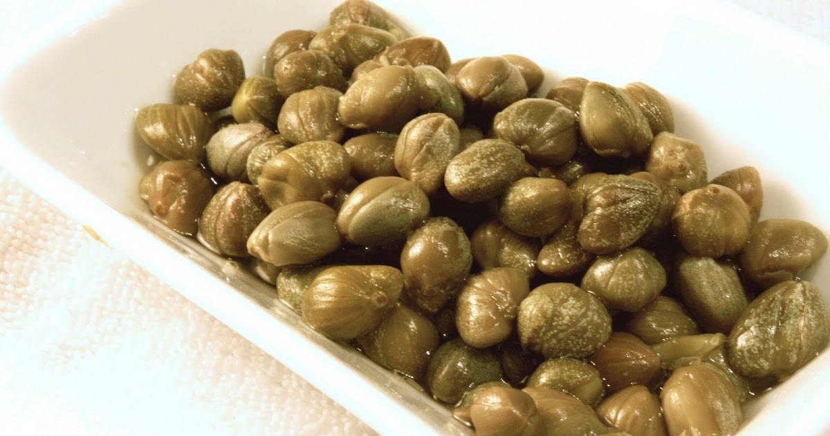 Capers Buds On A White Rectangle Platter Wallpaper