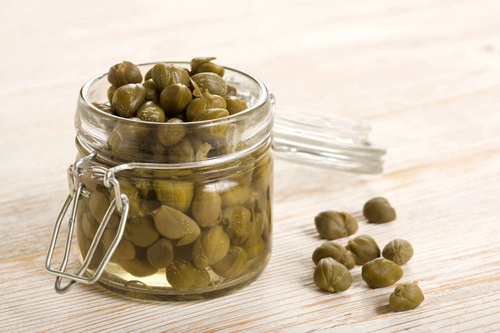 Capers In A Small Glass Jar Wallpaper