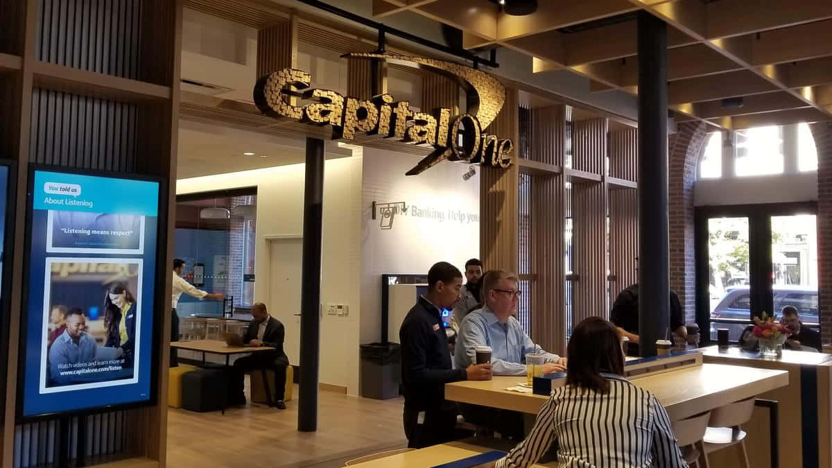 Capital One With People Sitting Wallpaper