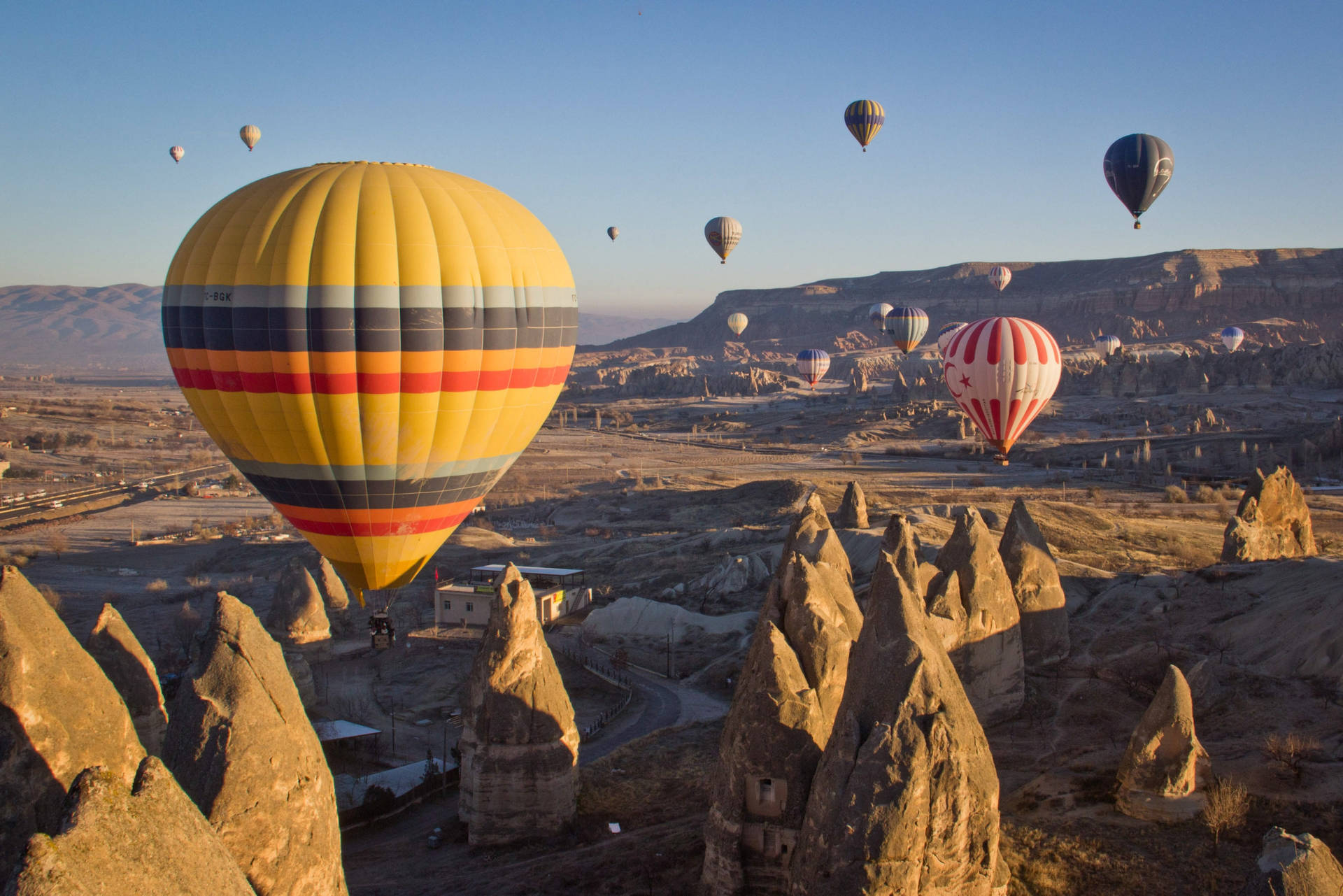 Cappadocia Balloons Over Rocks Wallpaper