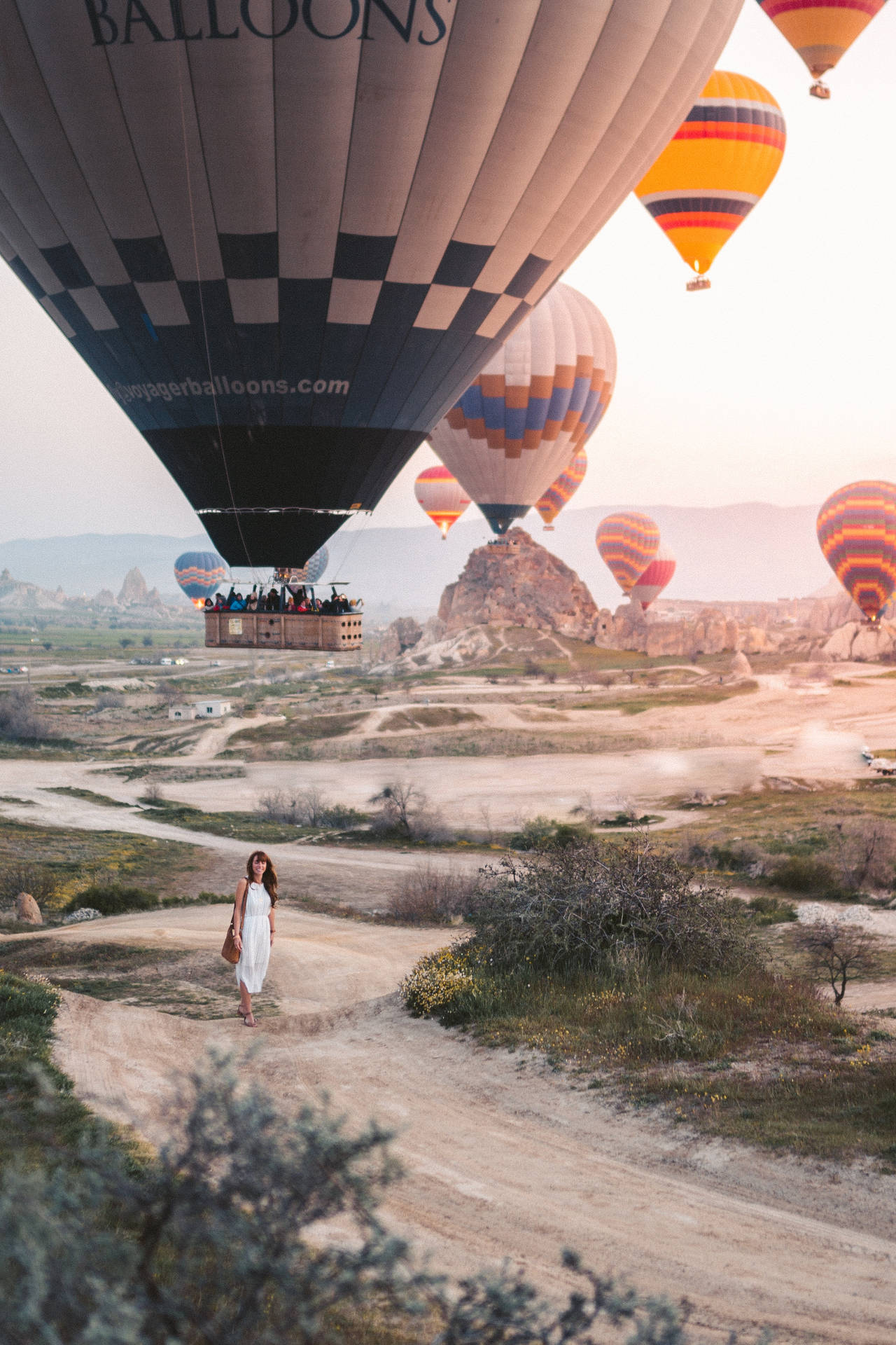 Cappadocia Woman Below Balloons Wallpaper
