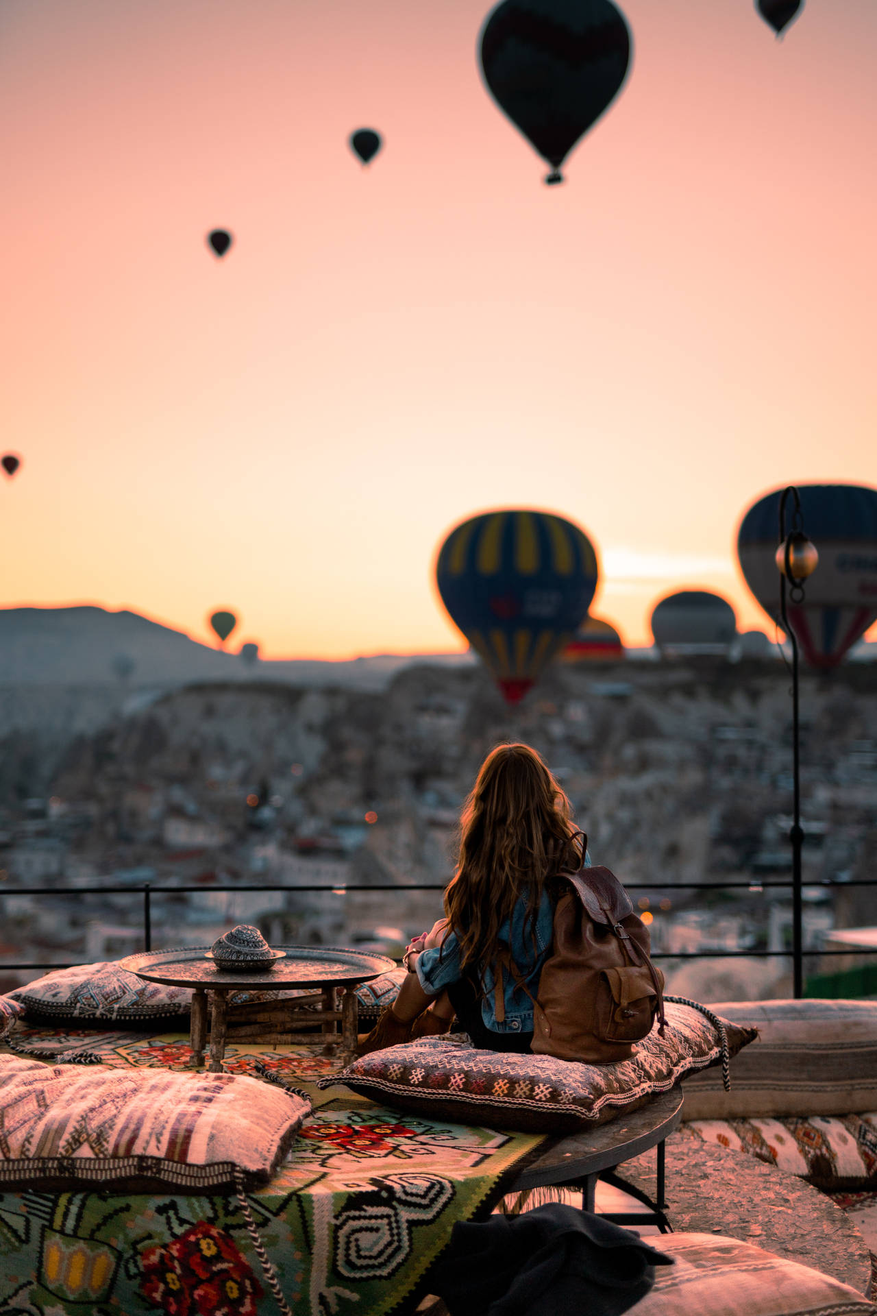 Cappadocia Woman Looking At Balloons Wallpaper