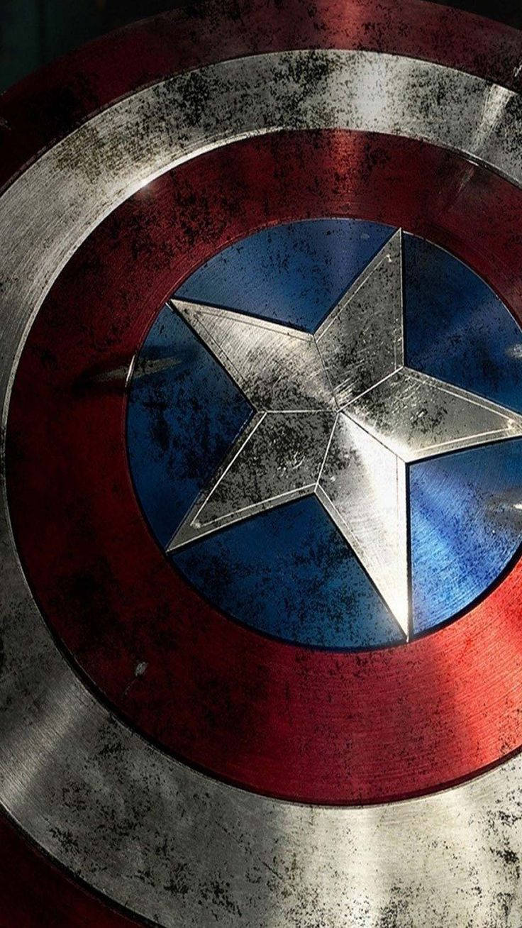 Caption: The Unyielding Strength - Captain America Holding his Shield Wallpaper