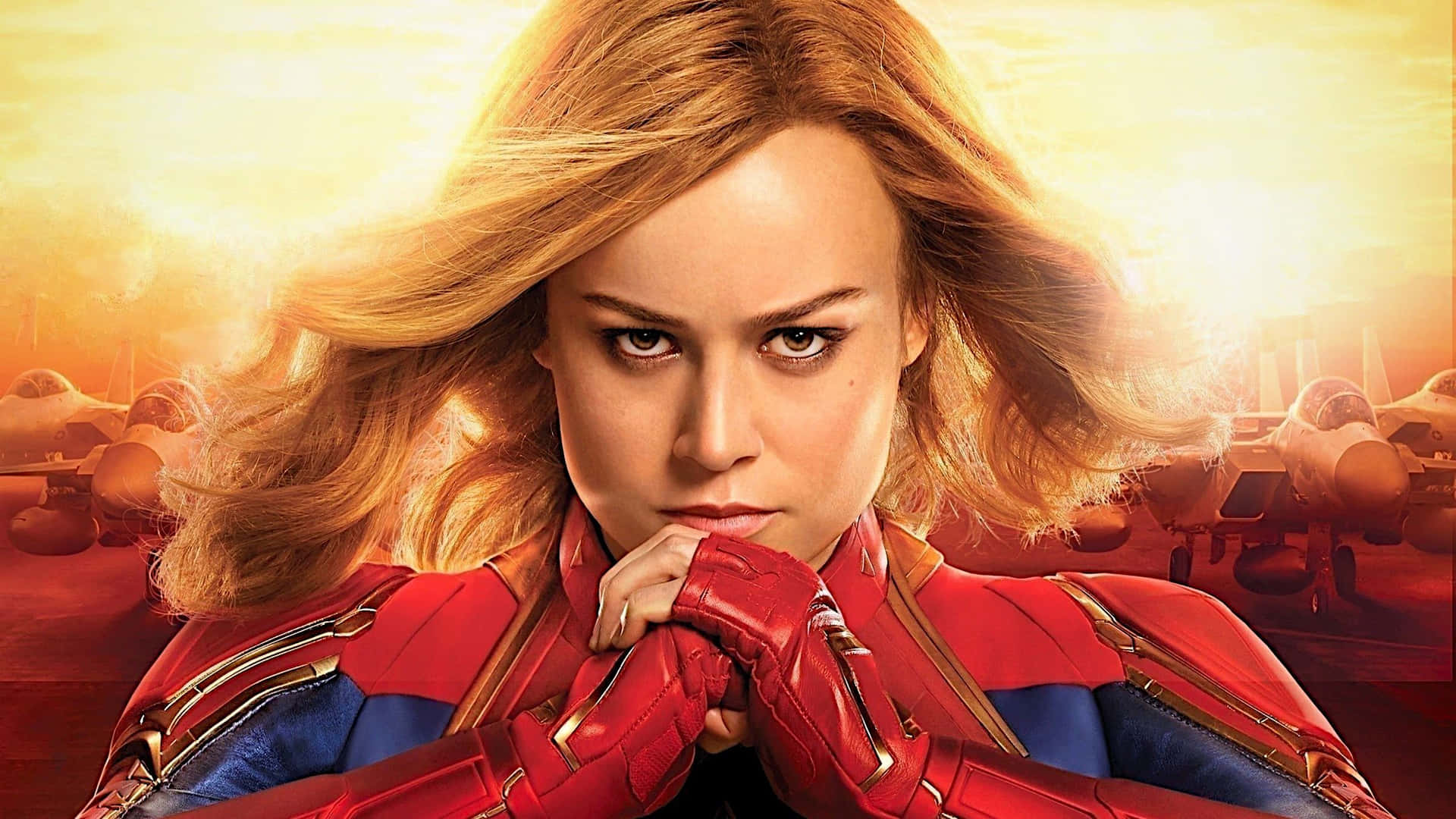 Brie Larson as Captain Marvel, bravely emerging in a new world. Wallpaper