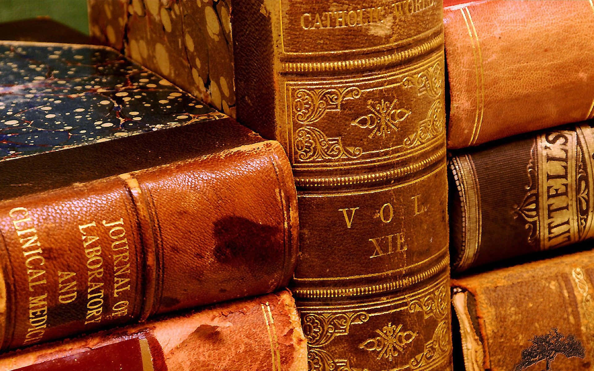 Caption: A Precious Collection Of Antique Books Wallpaper