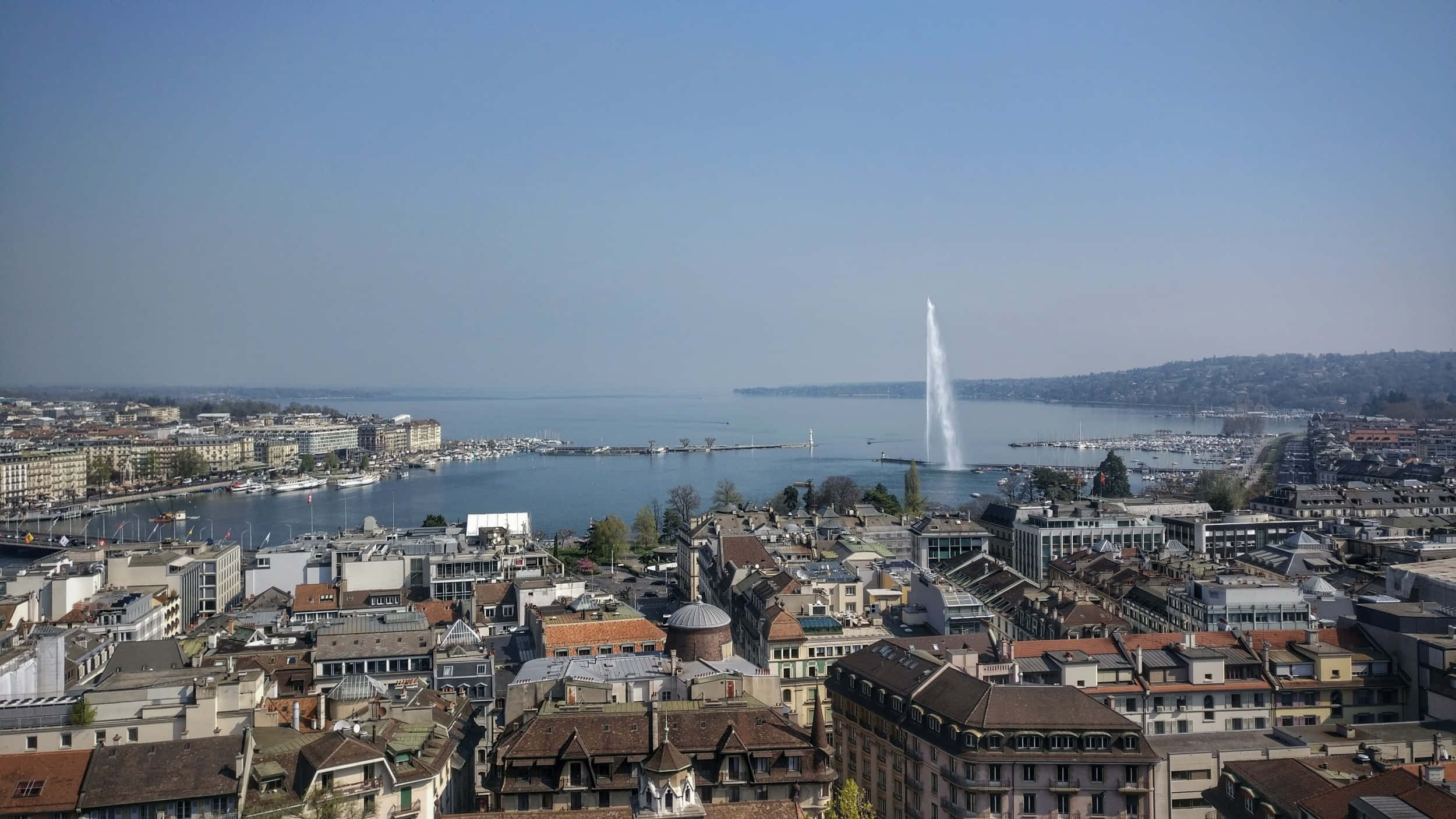 Bijschrift: Een Schilderachtig Uitzicht Op Genève, Zwitserland Bij Zonsondergang Achtergrond