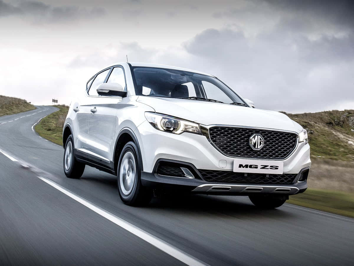 Caption: A Stunning Mg Zs In Vibrant Red Wallpaper