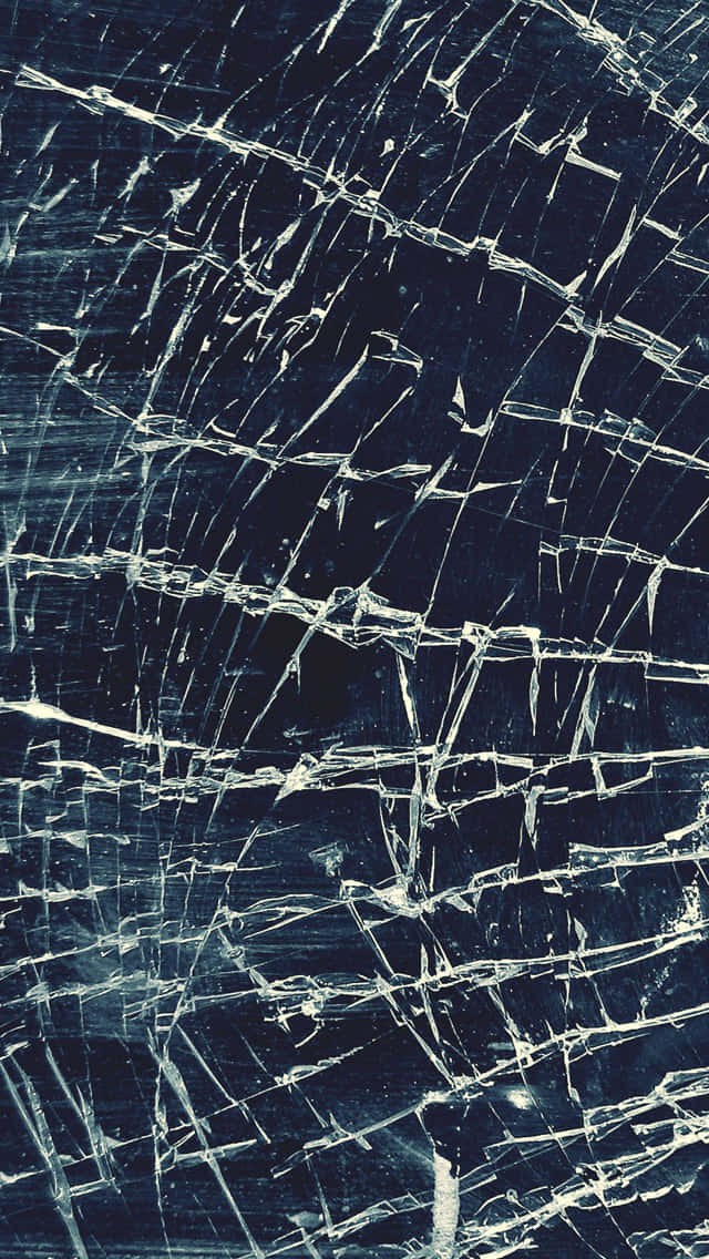 Caption: Abstract Visual Of A Shattered Glass Background
