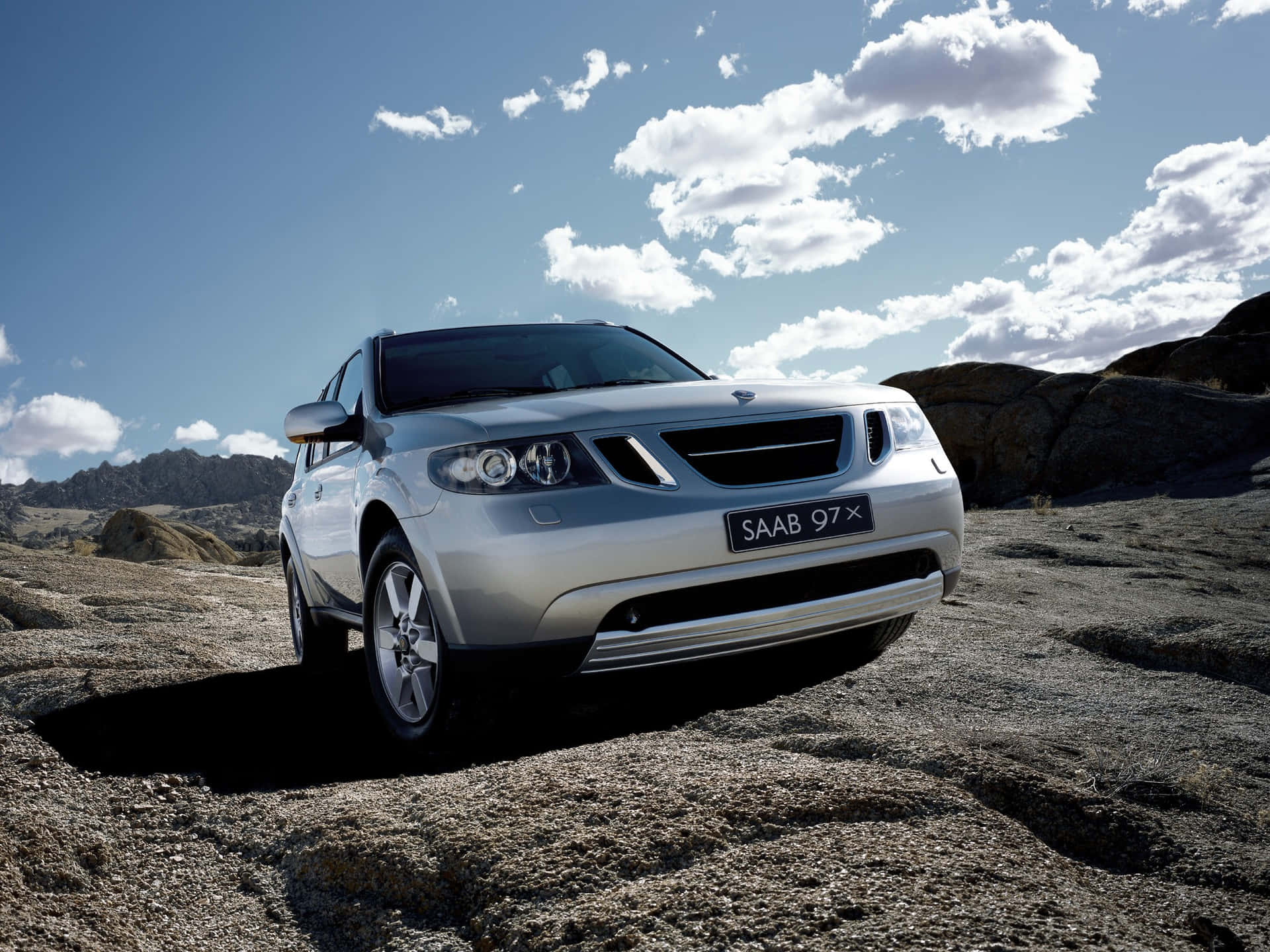 Caption: Alluring Saab 9-7x In Panoramic Landscape Wallpaper