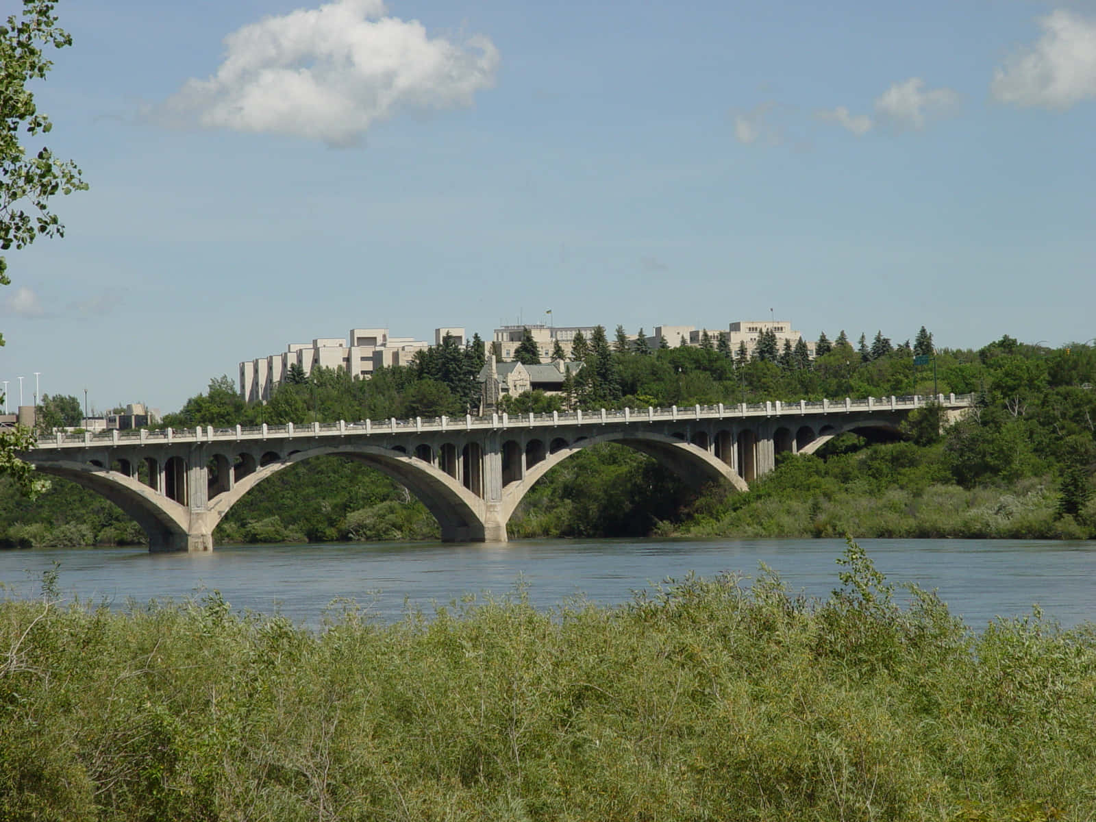 Caption: Breathtaking Skyline Of Saskatoon At Dusk Wallpaper