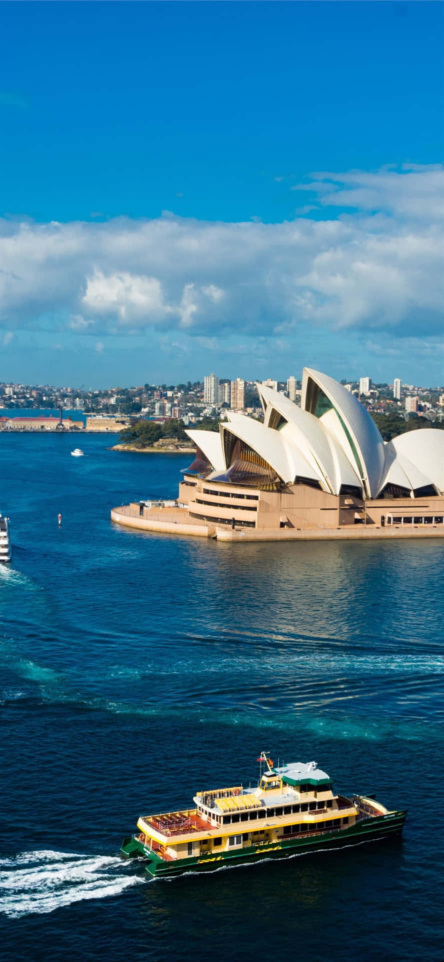 Caption: Breathtaking View Of The Sydney Opera House At Sunset