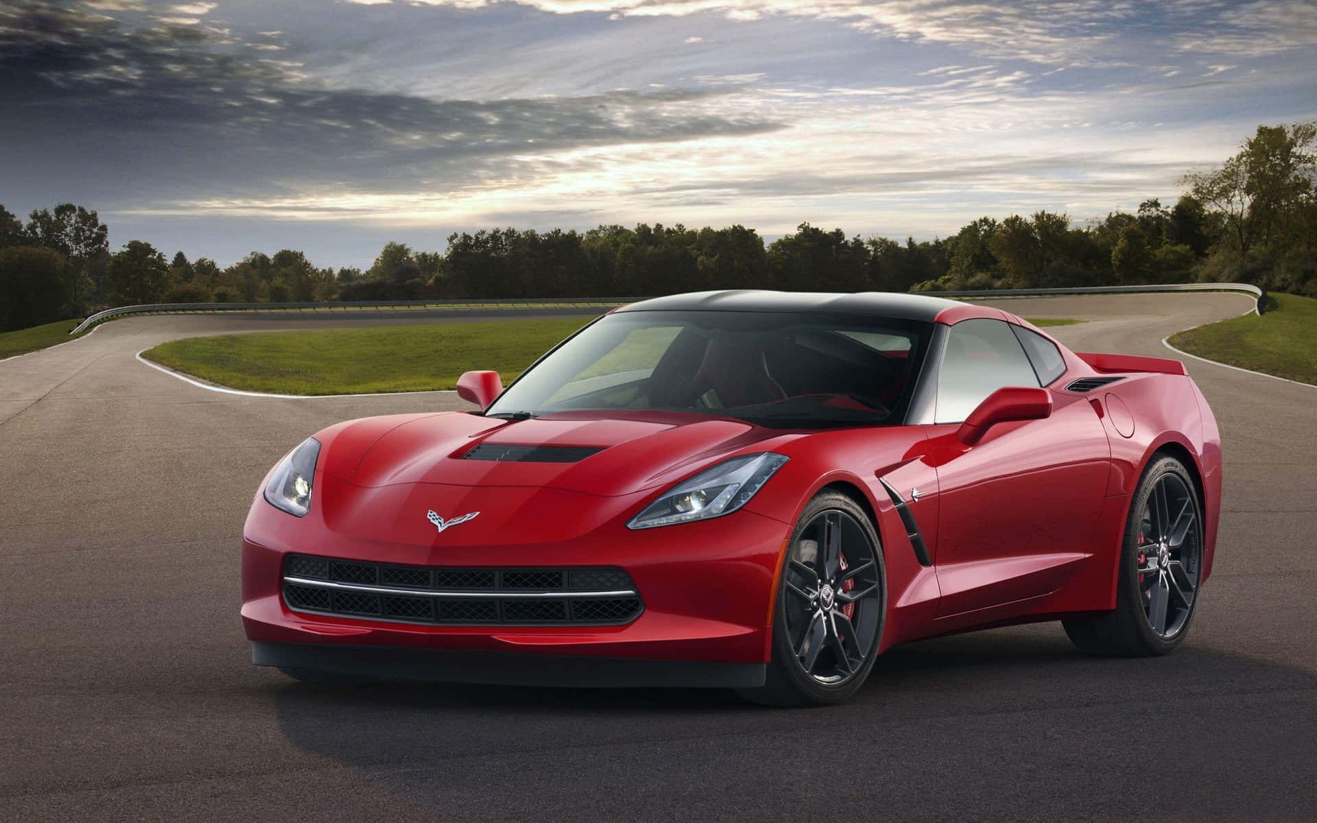 Caption: Captivating Chevrolet Corvette C7 In Stunning Sunset Wallpaper