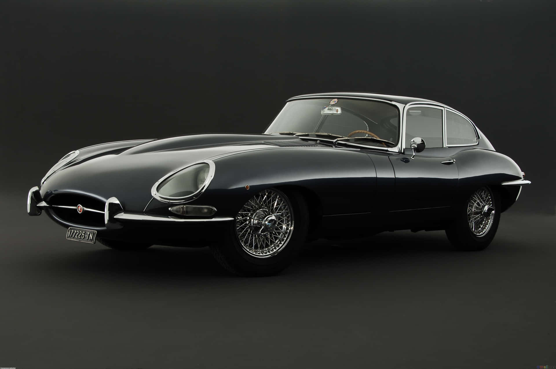 Caption: Captivating Elegance Of Jaguar E-type Wallpaper